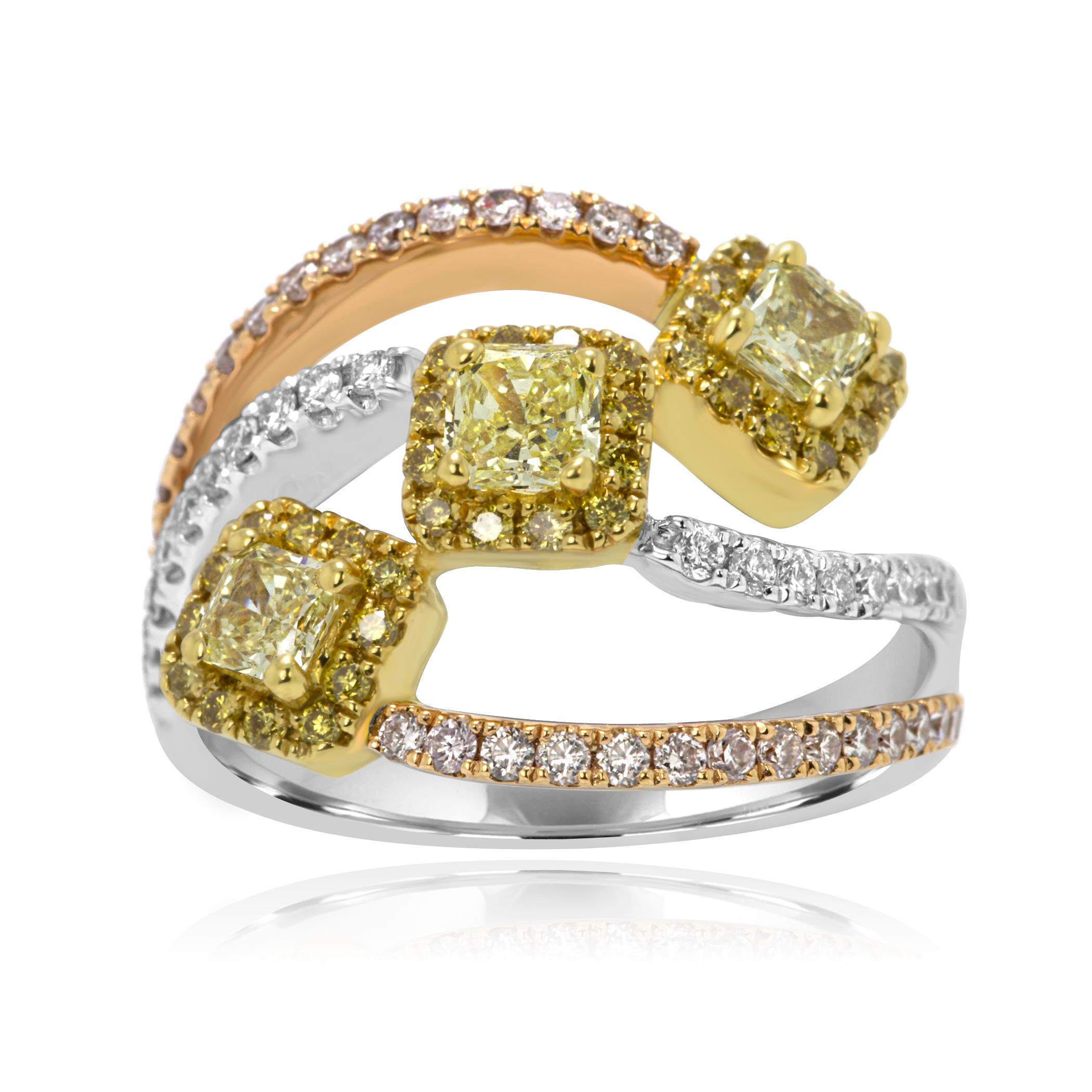 Stunning Three Stone Cocktail ring with 3 Natural Fancy Yellow Radiant Cut Diamonds 0.74 Carat Encircled in a Halo of Natural Fancy Yellow Round Diamonds 0.20 Carat with 2 Rows of Natural Pink Diamond Rounds 0.36 Carat on Side and One Row of White