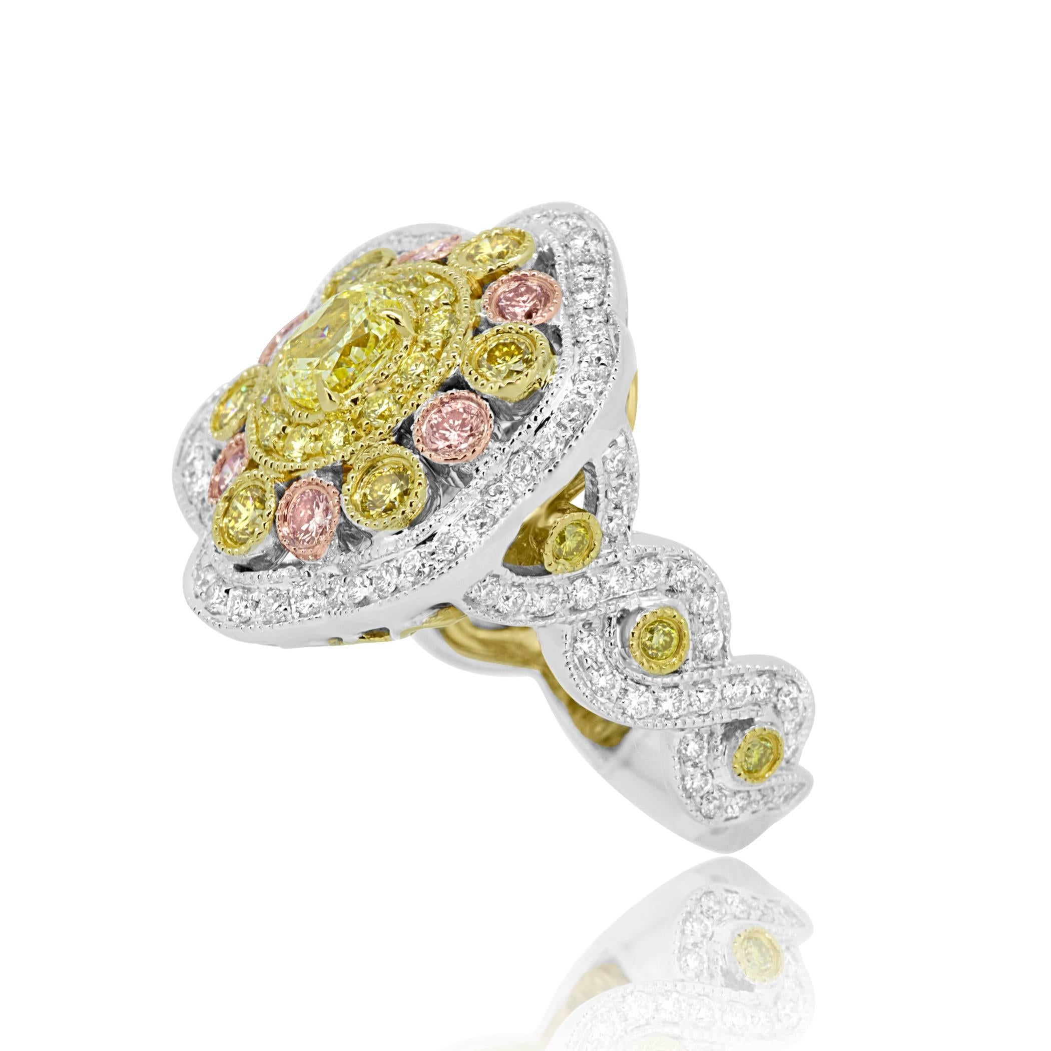 Fancy yellow Oval 0.56 Carat encircled by Fancy Yellow Diamond 0.64 carat, Natural Pink Diamond 0.25 Carat and White Diamond 0.65 Carat in 18K Yellow,Rose and white Gold with twisted rope shank. With Milgrain all around,