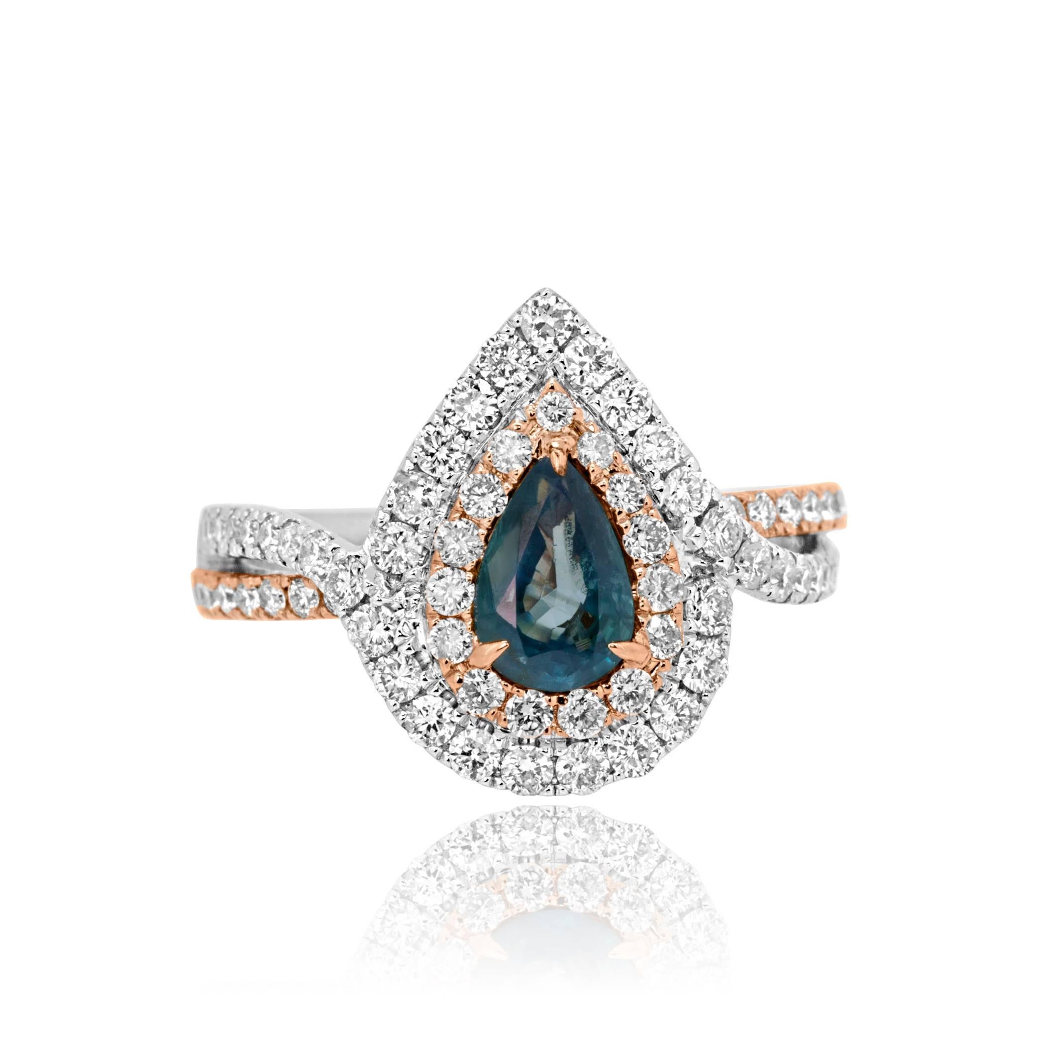 0.95 Carat Pear Shape Good Color Change Alexandrite Encircled in a Double Halo of white Diamonds 0.95 Carat in 18K White and Rose Gold.