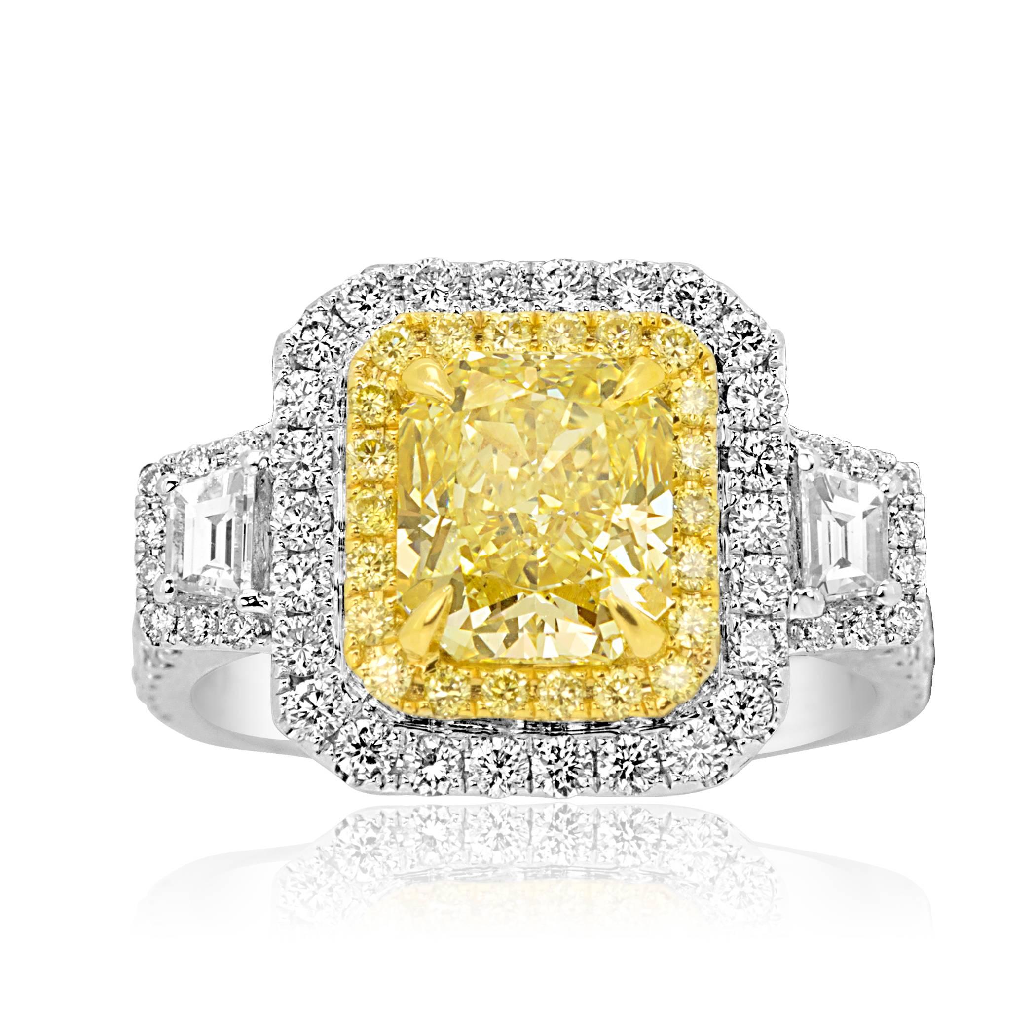 Stunning GIA certified 2.04 Carat VVS1 Radiant Cut Fancy Light Yellow Center Encircled in Double Halo of Natural Fancy Yellow Diamonds VS-SI clarity 0.32 Carat and White G-H Color VS-SI Clarity Diamond 1.14 Carat Flanked by Two White Diamond