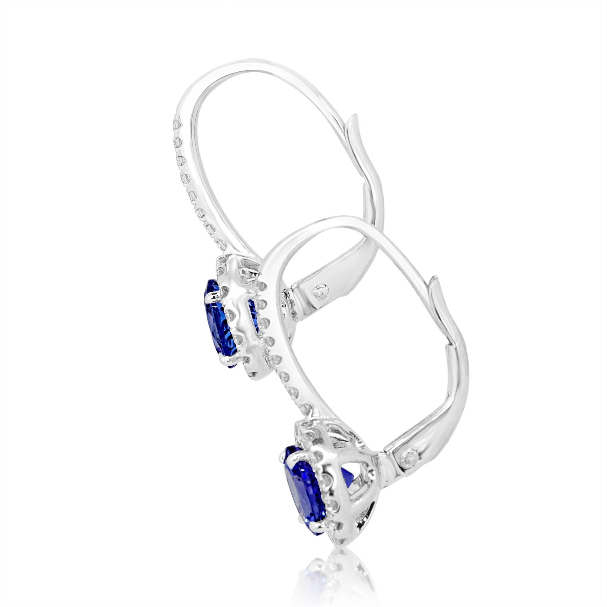 2 Tanzanite Round 2.38 Carat encircled in Halo Whited Diamond 0.50 Carat 14K White Gold Dangle Earring with French Lock.

Style available in different price ranges. Prices are based on your selection of 4C's Cut, Color, Carat, Clarity. Please