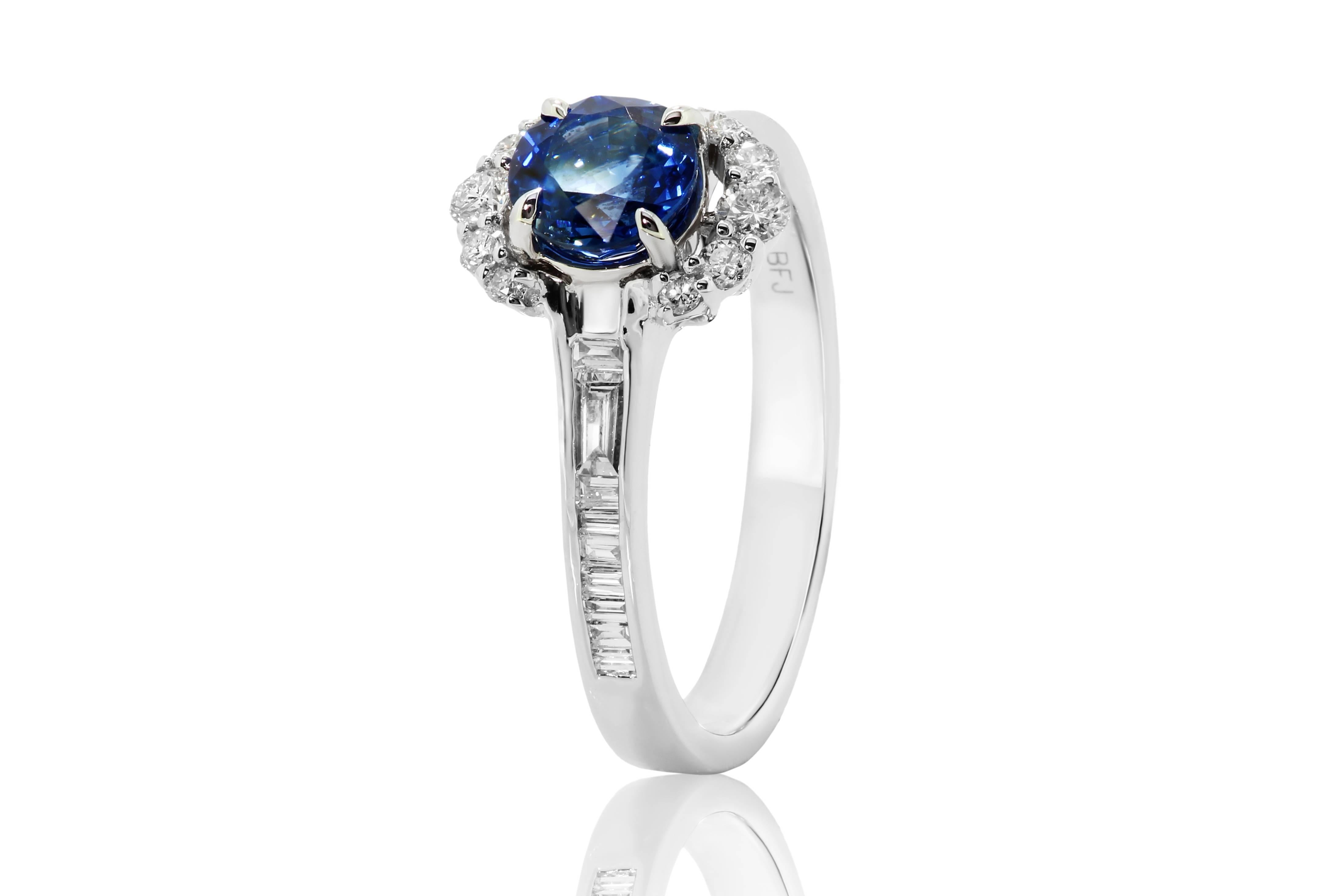 Stunning Blue Sapphire Round 0.98 Carat, encircled in half halo of 10 white diamond round  0.16 Carat, with 17 White diamond baguettes on the shank 0.30 Carat in 14K white gold Bridal Fashion ring .

Style available in different price ranges. Prices