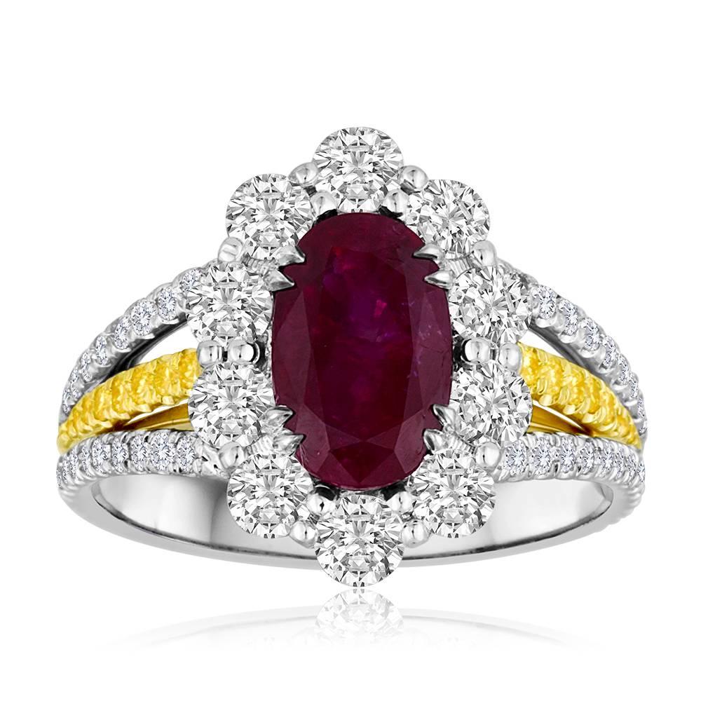  Rare GIA Certified Pigeons Blood No Heat Burma Ruby Oval 2.41 Carat Encircled in a Halo of white round diamonds VS Quality  1.44 Carat In a three row shank with Natural Yellow Diamonds VS-SI quality  0.12 Carat in 18K White and Yellow Gold Handmade