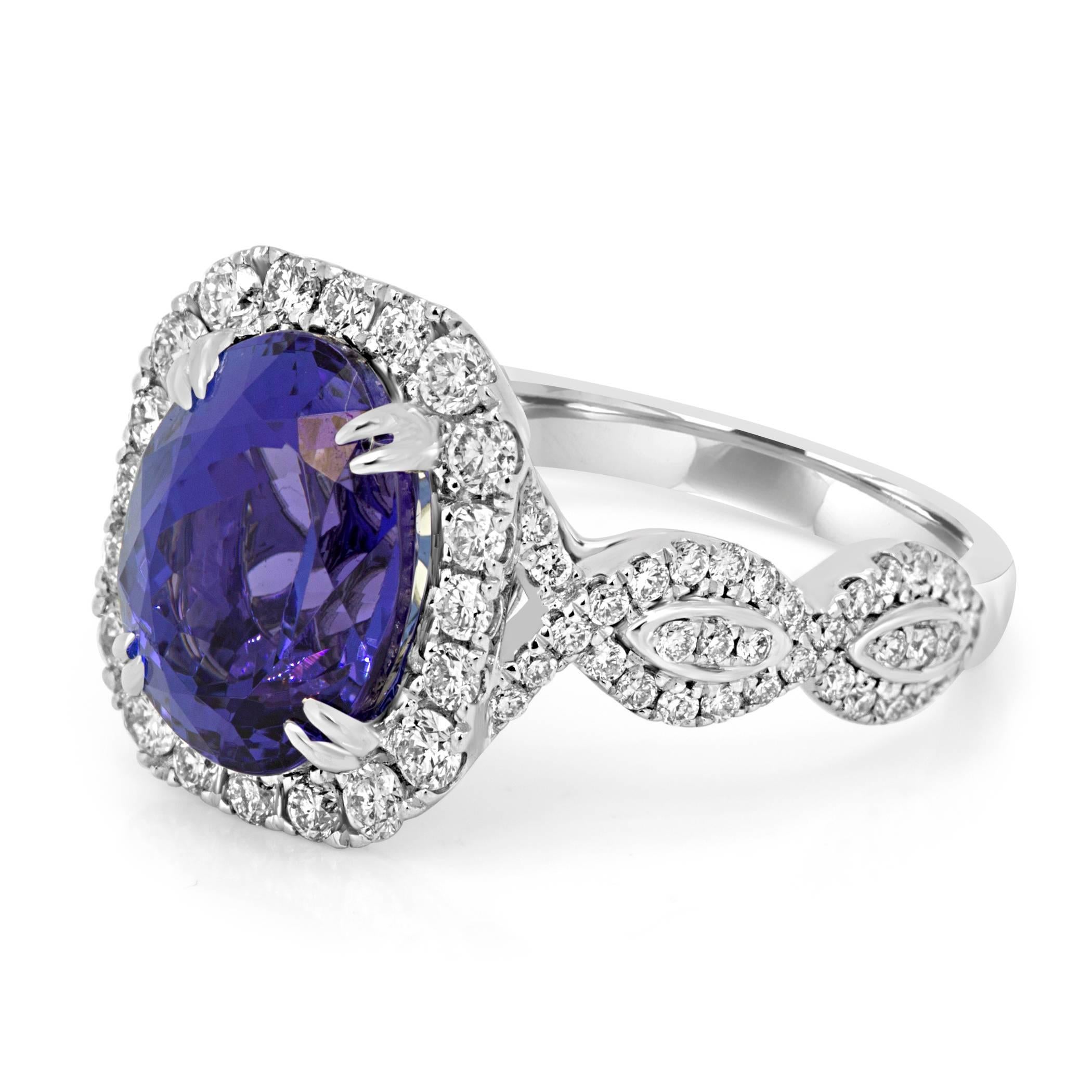 Stunning 4.00 Carat Cushion shaped Tanzanite Encircled in a Halo of White Colorless Diamonds VS-SI Clarity 0.80 Carat in 18K White Gold with twisted rope Shank Bridal Fashion Cocktail Ring.

Style available in different price ranges. Prices are