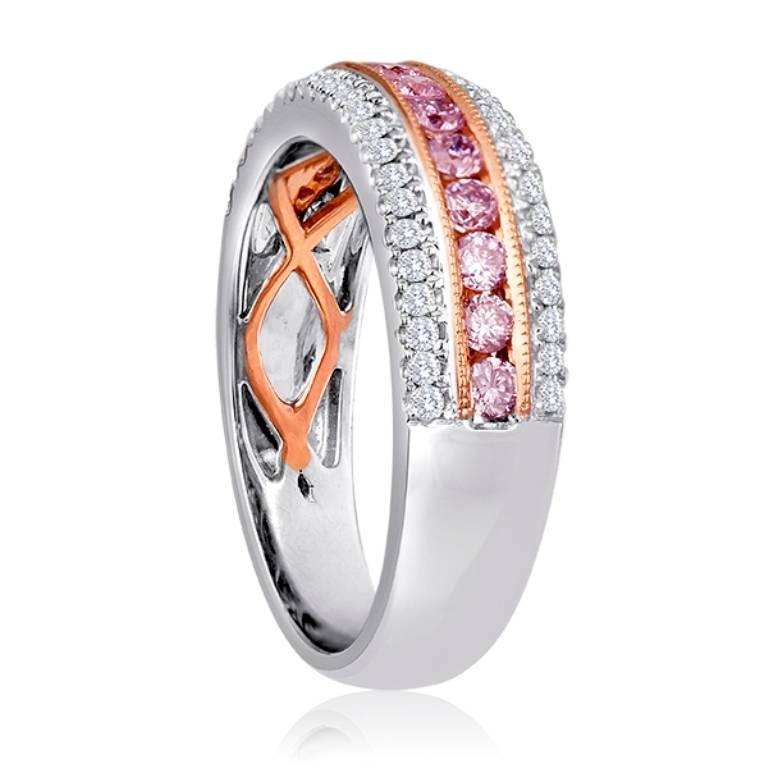 Gorgeous Natural Pink Diamonds 0.47 Carat Flanked By Two Rows of White Diamond Round on the Sides 0.28 Carat  in 18K White and Rose Gold Band Ring.

Total Diamond Weight 0.75 Carat