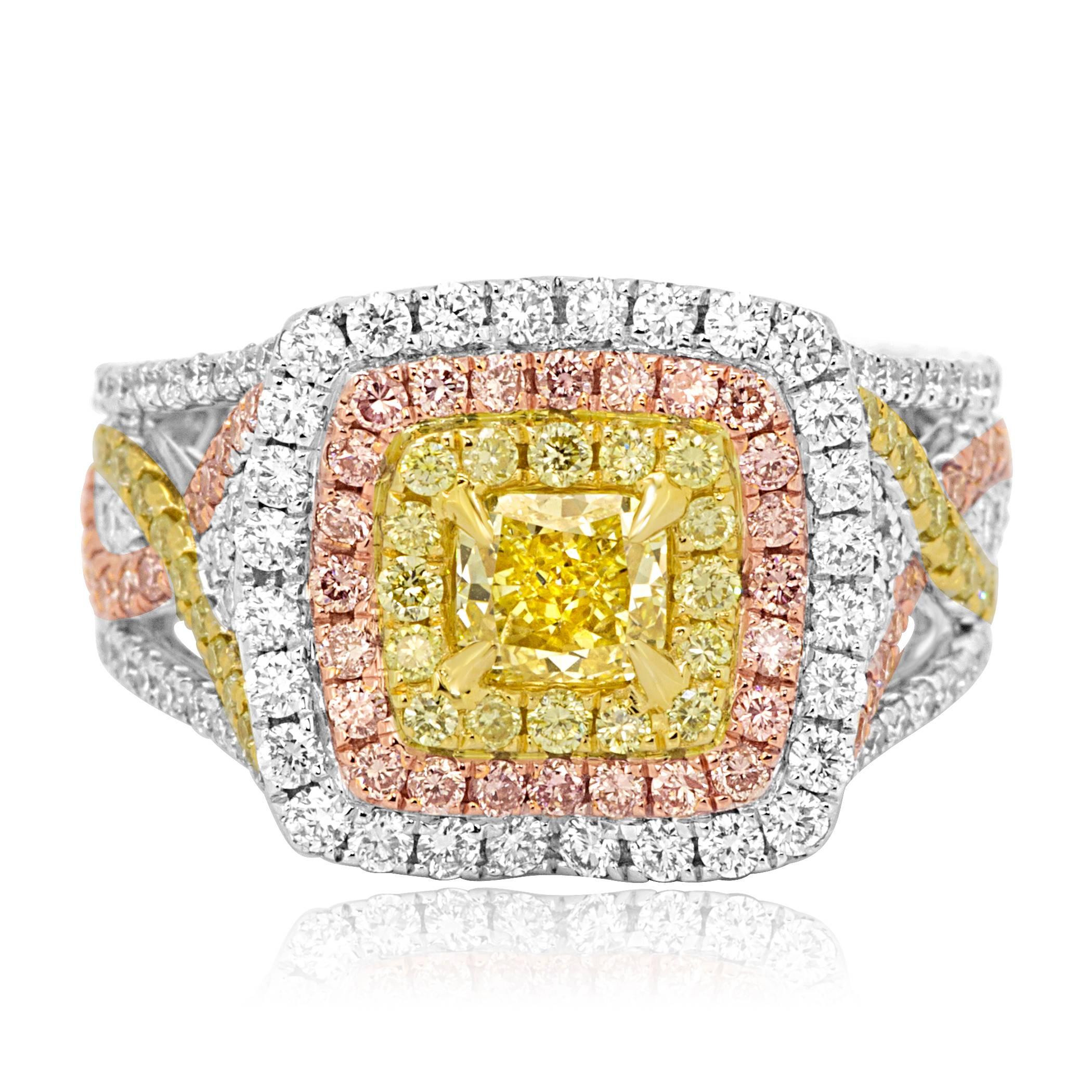 GIA certified 0.62 Carat Fancy Intense Yellow Cushion encircled in Triple Halo of Natural Yellow Diamonds 0.50 Carat, Natural Pink Diamonds 0.45 Carat and White diamonds 0.82 Carat in 18K White,Rose and Yellow Gold Ring.

Style available in