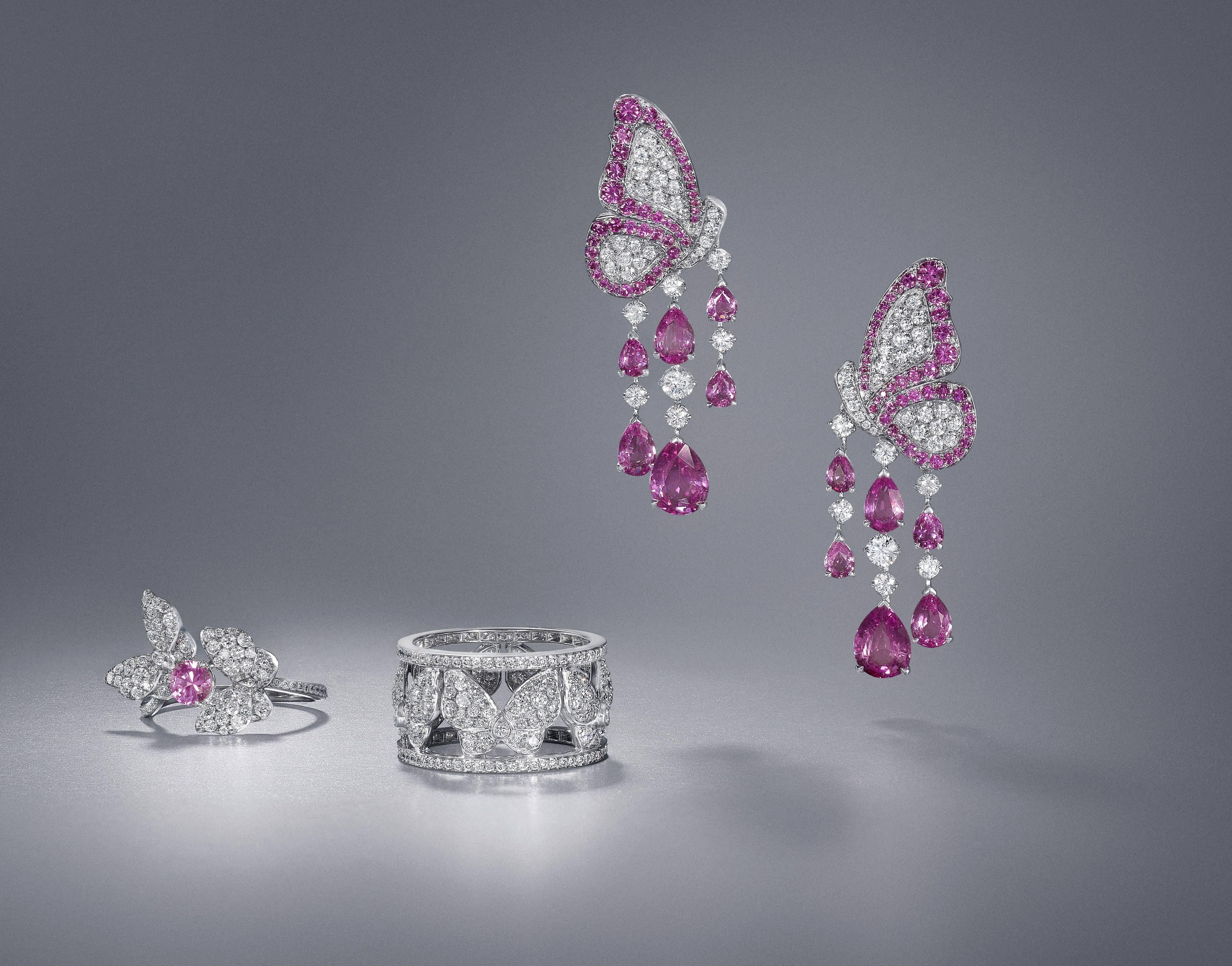 Earrings crafted in 18K white gold                                                              Diamonds GVS x68 = 1.51 carats / Pink sapphire x98                                        Total carat weight = 6.61