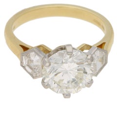 Three-Stone Round Brilliant Cut Diamond Engagement Ring