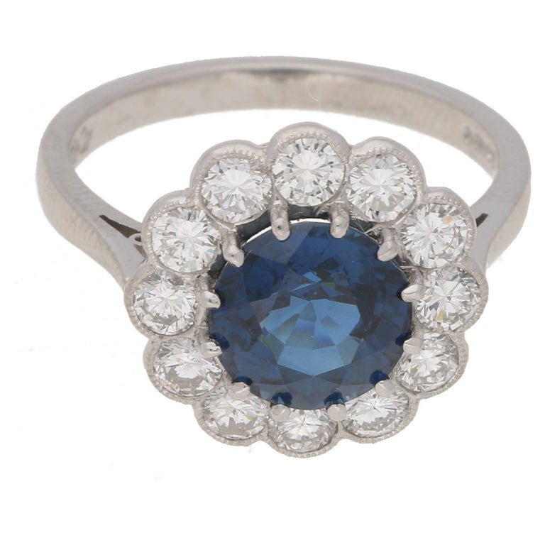 Blue Sapphire Diamond and Platinum Cluster Ring For Sale at 1stdibs