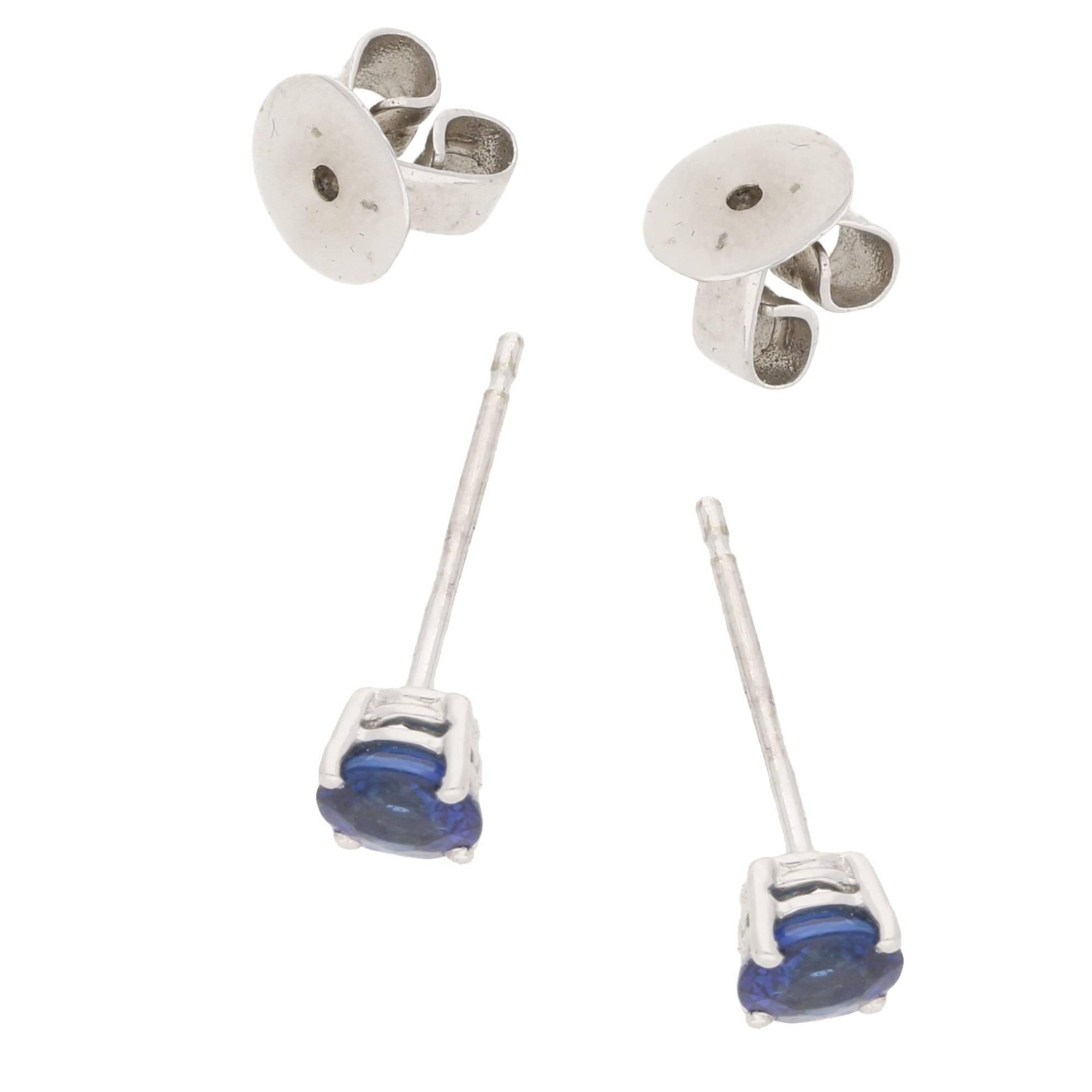 A simple pair of blue sapphire stud earrings, the sapphires totaling 0.81cts. These are set into neat four claw settings, on a post and butterfly back.