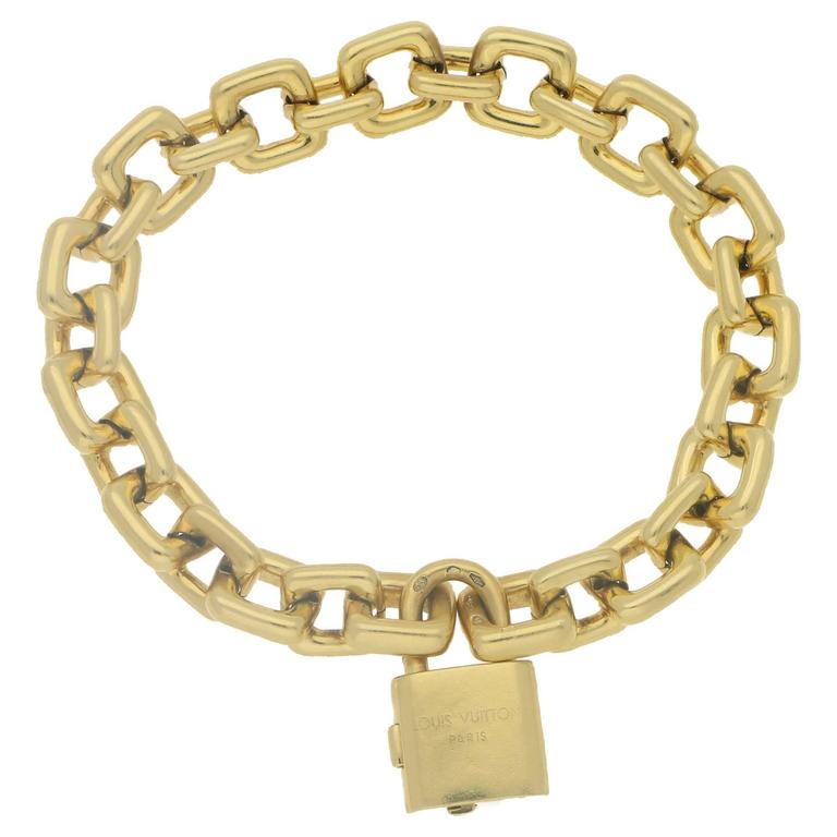 Vintage 18 Karat Gold Louis Vuitton Padlock Bracelet at 1stDibs
