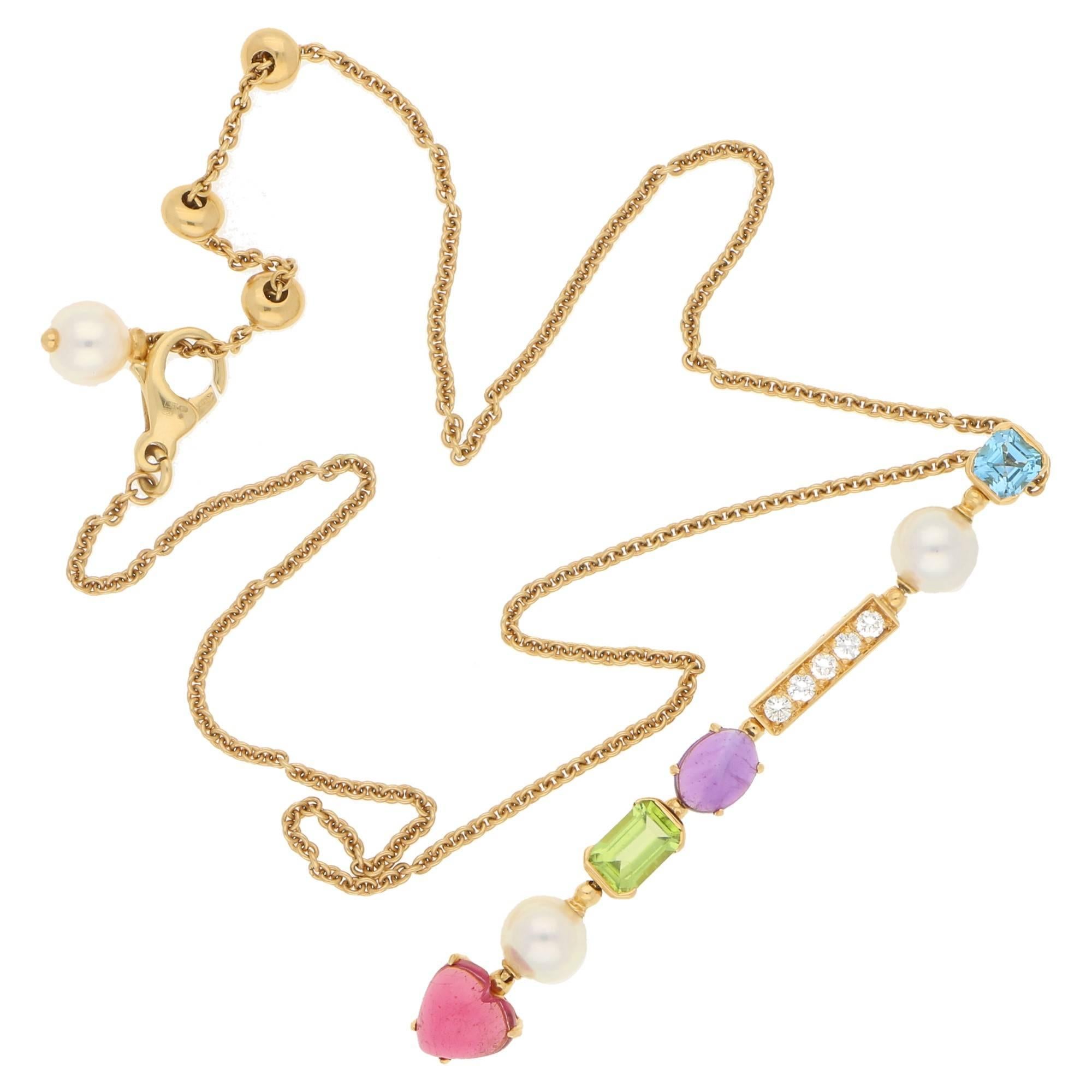 Beautiful and contemporary 18ct yellow gold Bvlgari pendant on chain with pearl detailing. This pendant features multiple stunning stones in varying designs including blue topaz, akoya cultured pearls, diamonds, amethyst, peridot and pink