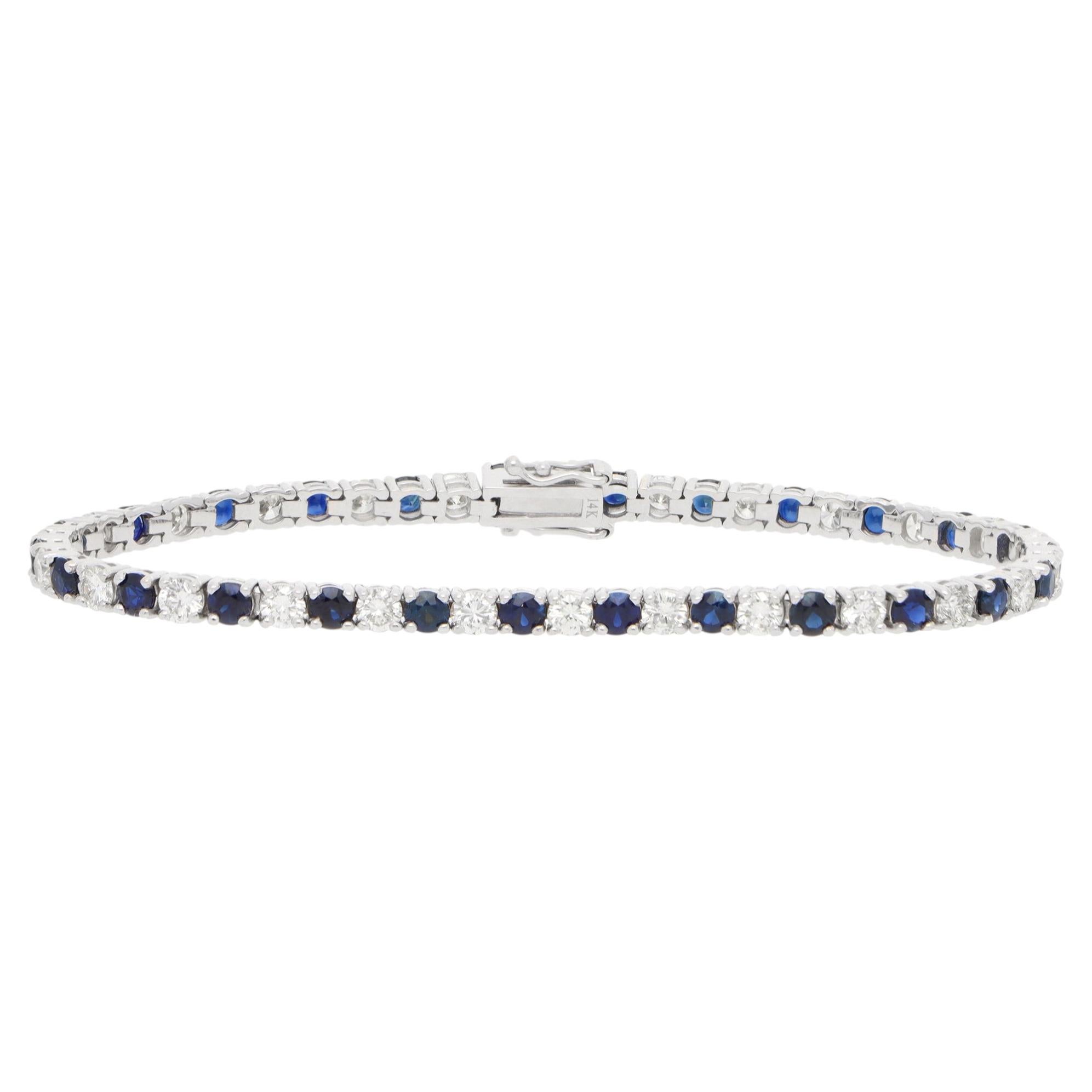 Bracelet « tennis » vintage en or blanc, serti de saphirs et de diamants (8,02 carats au total) en vente