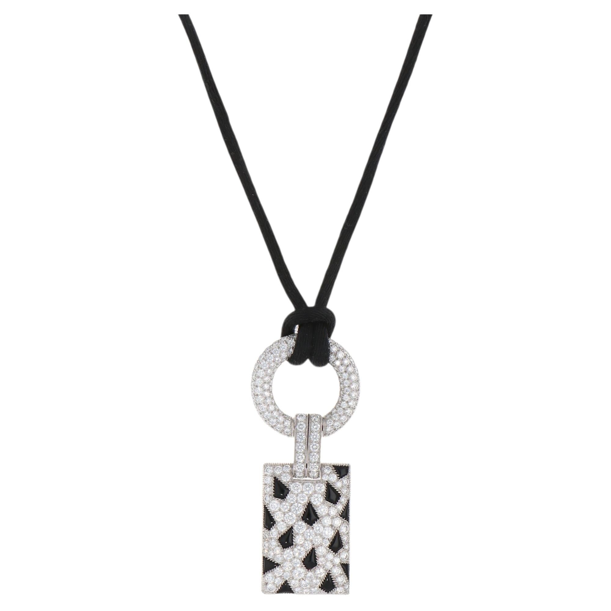 Collier vintage « Panthère de Cartier » avec diamants et cordon noir en onyx