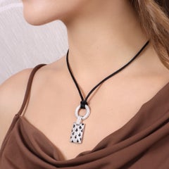 Vintage Panthère de Cartier Diamond and Onyx Black Cord Necklace
