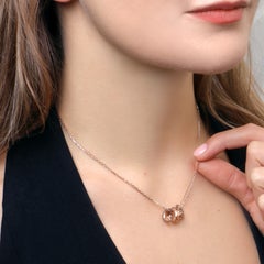 Collier vintage Cartier « LOVE » à trois anneaux sertis de diamants