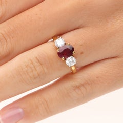 Contemporary 1.49ct Certified Oval Burmese Ruby and Diamond Three Stone Ring
