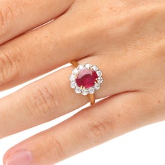 Contemporary Certified 2.31ct Oval Burmese Ruby and Diamond Cluster Ring