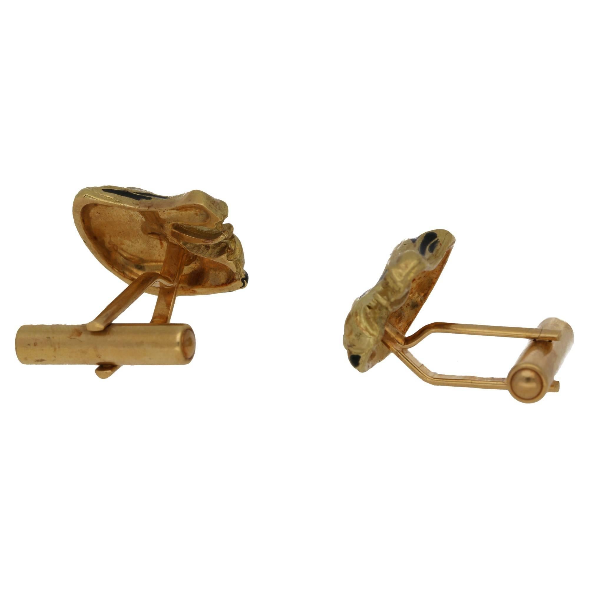 A smart pair of vintage tiger head cufflinks, circa 1980. These are in great condition, they are hallmarked with the owl bearing a '75' across it's chest. This indicates that they are French in origin, specifically Paris. The black striped detailing