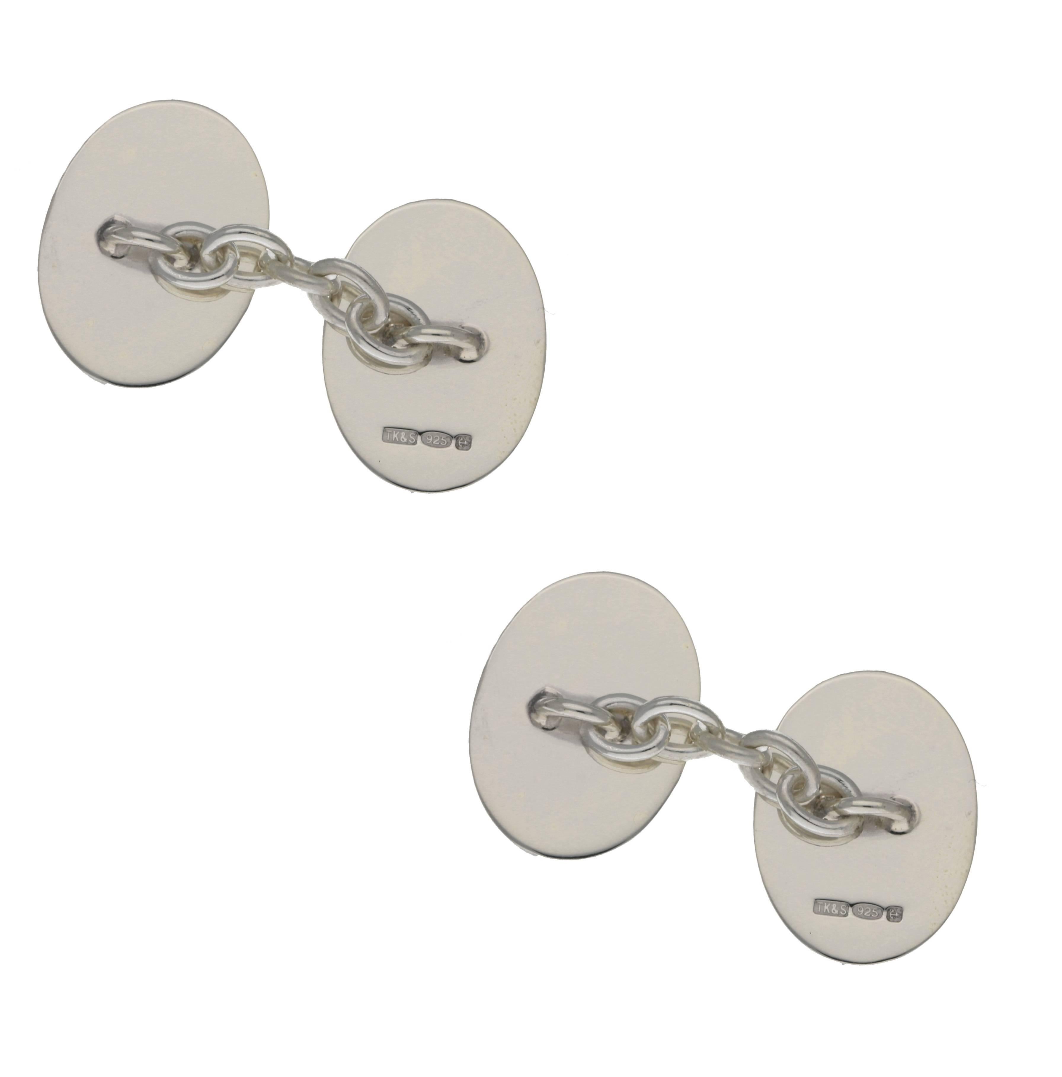 A smart pair of British sterling 925 silver cufflinks. With stunning enamel detail in the form of an eagles head. On classic five link chain fittings. These come in a beautiful Susannah Lovis presentation box for gifting.