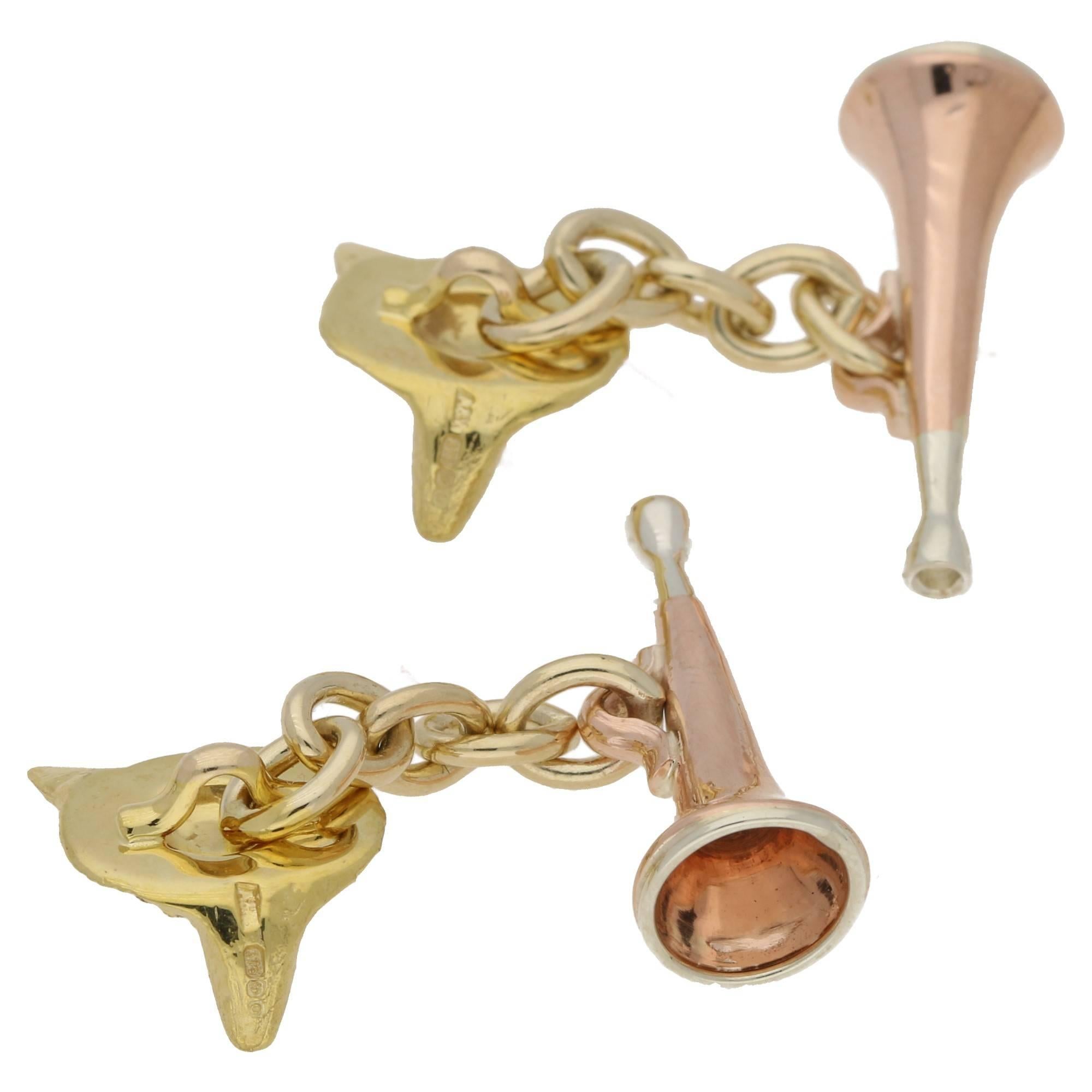 A fun pair of foxes head and horn cufflinks, in various colours of 9 karat gold. On five link chain fittings. These come in a smart Susannah Lovis presentation box.