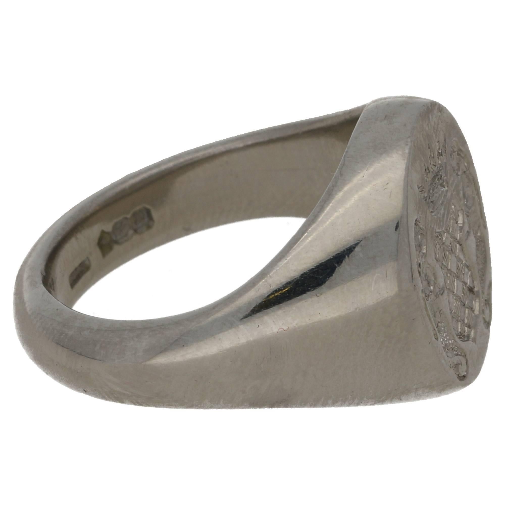 A signet ring with detailed crest, in fully hallmarked platinum. This ring can be sized to fit, presently a UK size N