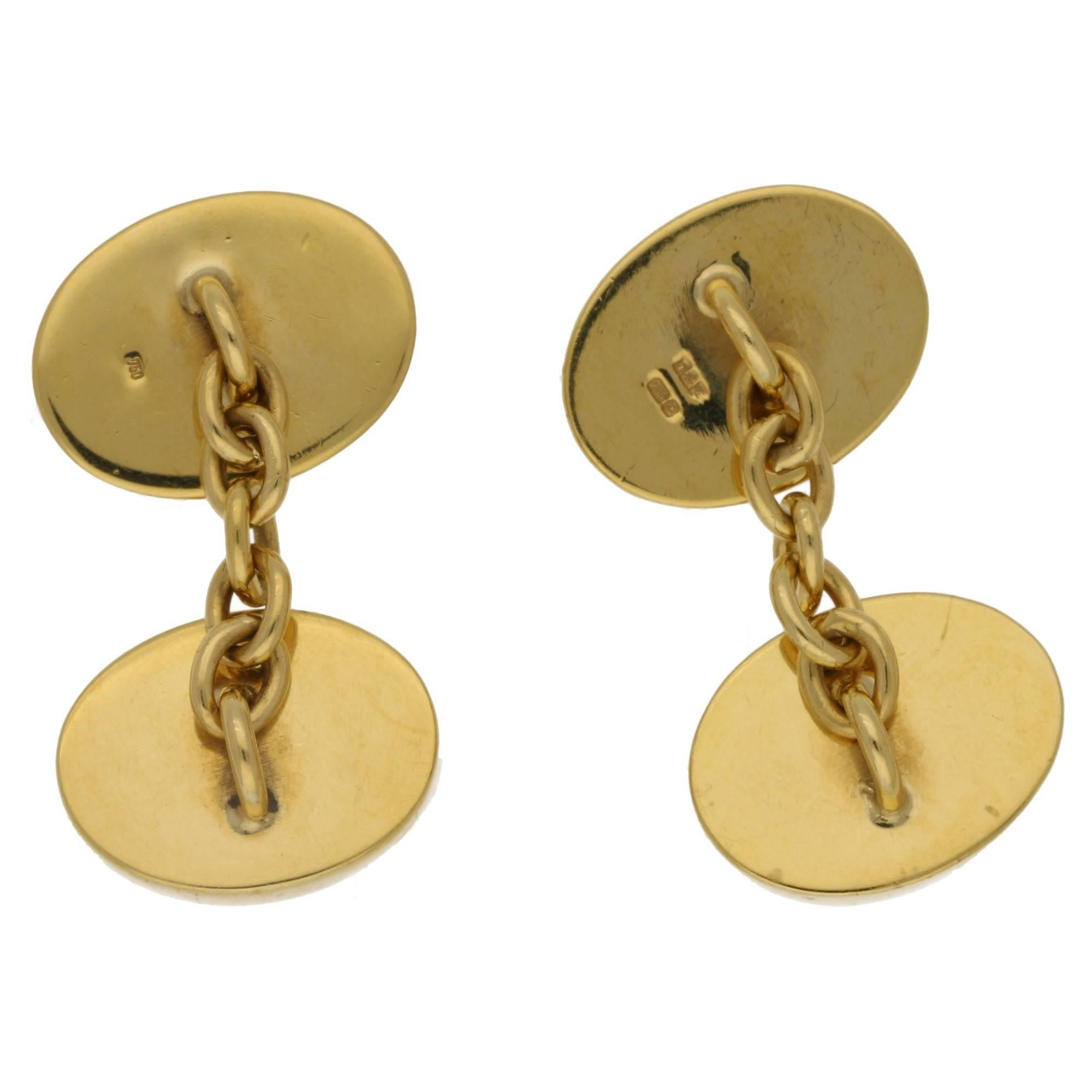 These cufflinks are stunningly detailed, depicting on one side a duck in flight and the other a duck standing. The colours are vibrant and these are set in a rich 18k gold on a classic five link chain fitting. A beautiful example of British made