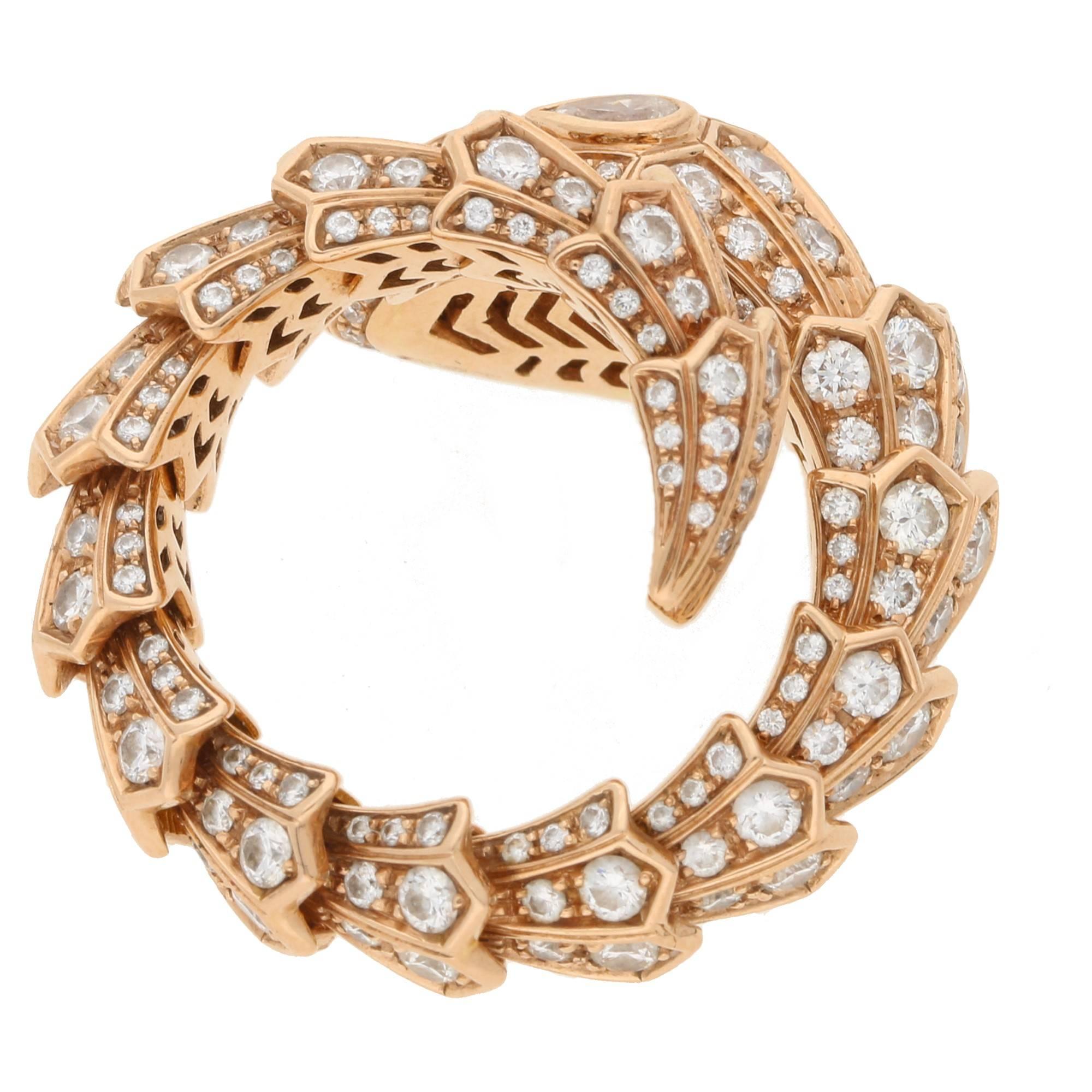 A pave diamond set snake ring signed Bulgari. From the Bulgari Serpenti range the ring coils around the finger in an articulated manner. The ring is made in 18ct rose gold and has approximately 3.20ct of diamonds set in it, the diamonds are