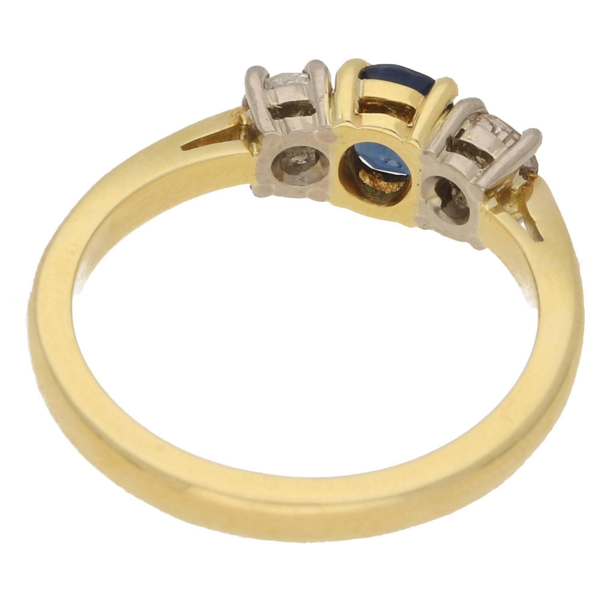 A vintage sapphire and diamond three stone ring, the central sapphire measuring an estimated 0.52cts. The shoulder diamonds are approximately 0.4cts in total. On a yellow gold hallmarked band. Ring size is a UK M 1/2 but this can be easily resized.