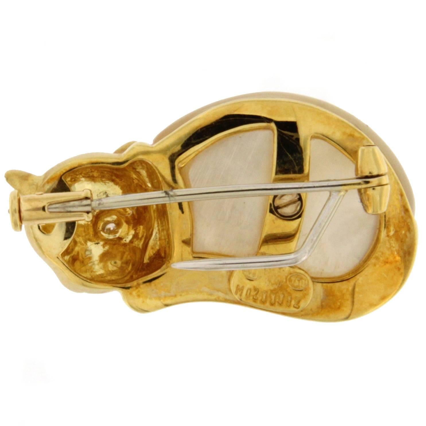 Jona design collection, 18 karat yellow gold cat shaped brooch, set with a mother of pearl body and white diamond eyes.    
All Jona jewelry is new and has never been previously owned or worn. Each item will arrive at your door beautifully gift