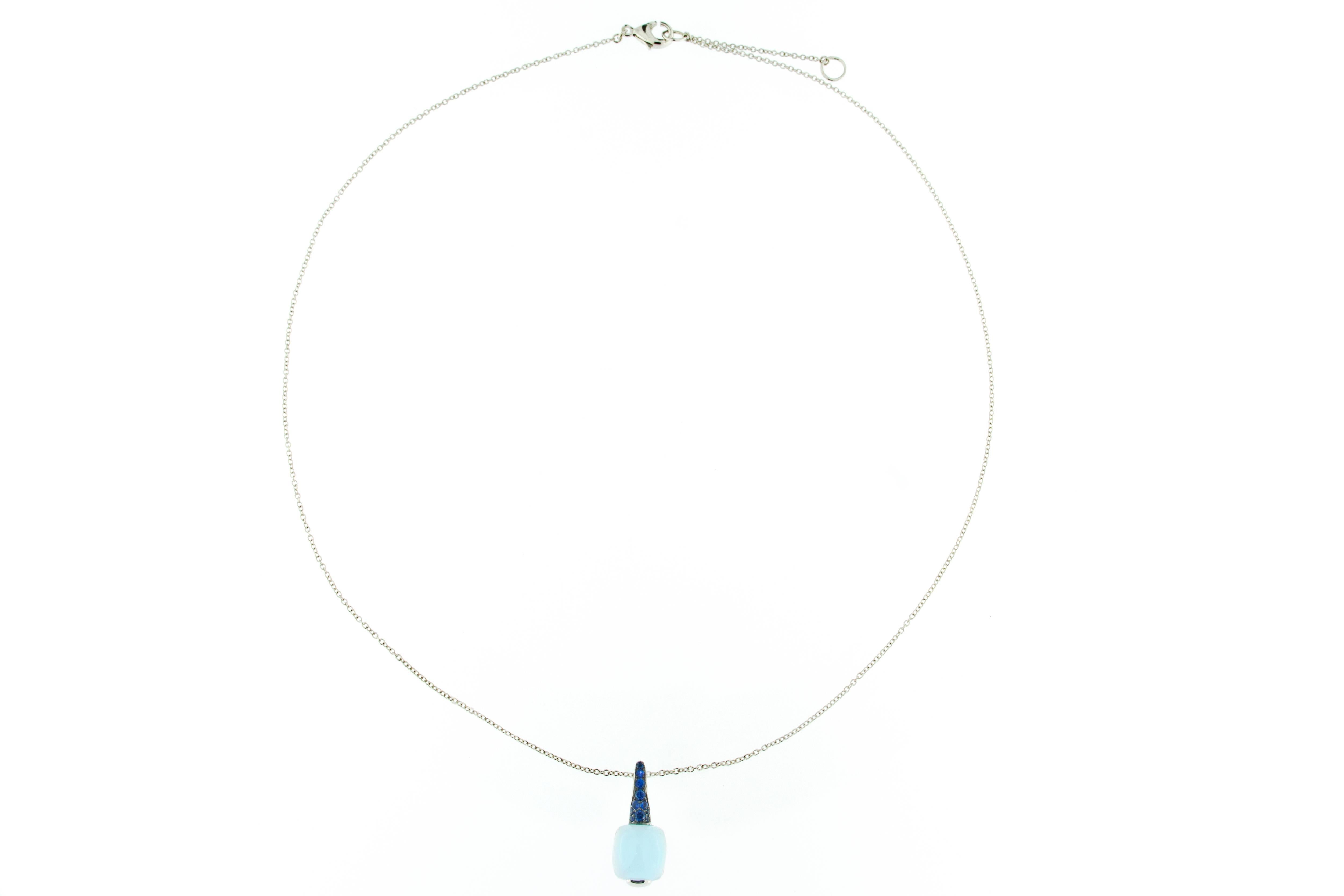 Jona design collection, hand crafted in Italy, 18 karat white gold pendant set with a cabchon aquamarine weighing 3.5 carats and 0.14 carats of blue sapphires, suspending from a 18 inch long, 18k white gold chain.
Dimensions:0.77 in L / 0.34 in W /