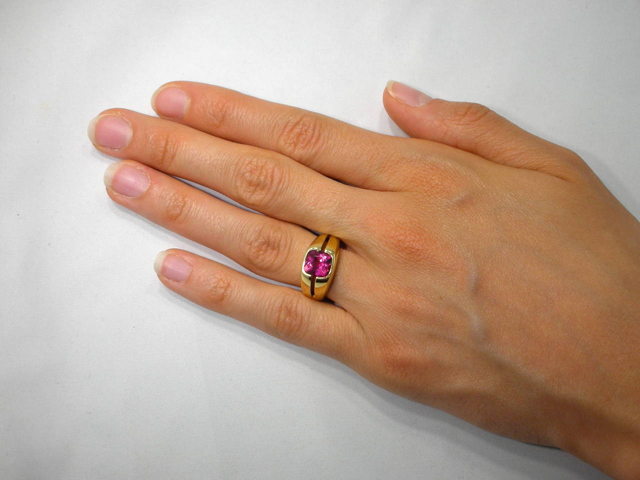 18k yellow gold ring band featuring a 2.05 carat Rubellite. Hand made in Italy by Jona. Size 7 (can be sized).

All of our jewelry is new and has never been previously owned or worn.