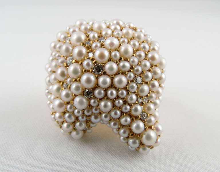 Jona design collection, hand crafted in Italy, 18 karat yellow gold ring, set with a pearl & diamond pavé (11.76 carats of Pearls and 0.40 carats of white diamonds; size 6.5 (can be sized).

All Jona jewelry is new and has never been previously