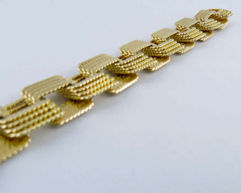 Jona design collection, hand made in Italy, 18 karat yellow gold interlocking link bracelet.

All of our jewelry is new and has never been previously owned or worn.