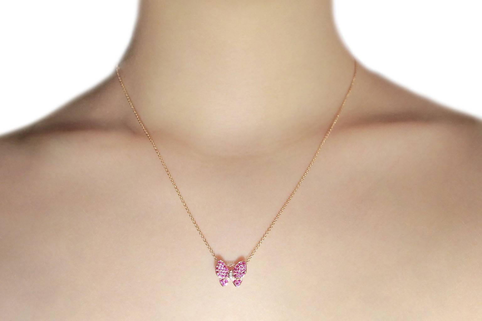 Jona design collection, hand crafted in Italy, butterfly pendant in 18 karat rose gold  set with 0.38 carats of pink sapphires and 0.01ct. of white diamonds  and mounted on a 18 karat rose gold chain, 17.71 inch long. 
All Jona jewelry is new and