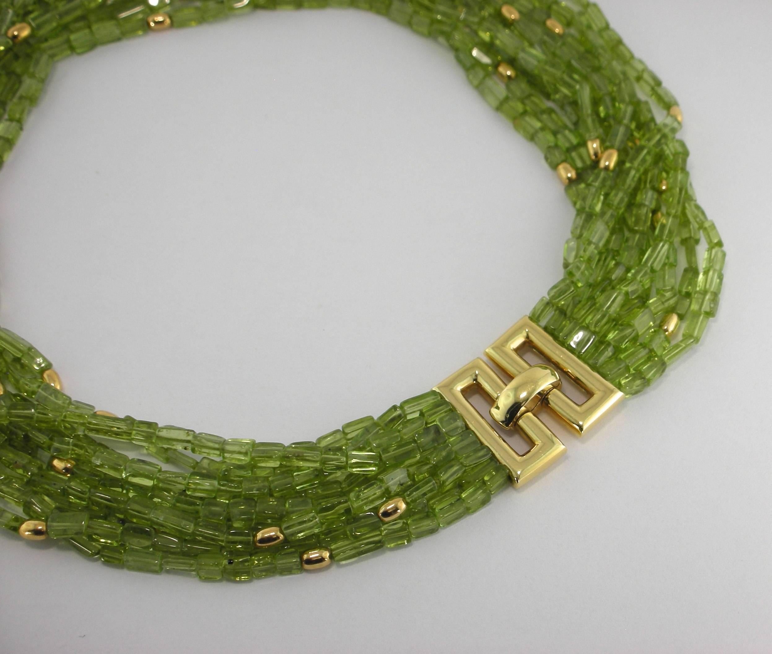 Jona design collection, hand crafted in Italy, 18 karat yellow gold multi-strand necklace, featuring 500 carats of peridot.

All of our jewelry is new and has never been previously owned or worn.