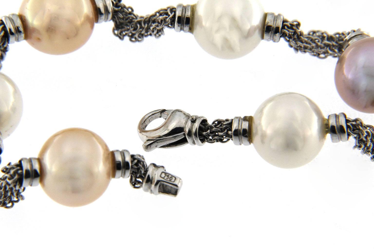 Jona design collection, hand crafted in Italy, 18 karat white gold chain bracelet, alternating white and pink Japanese cultured pearls.
All Jona jewelry is new and has never been previously owned or worn. Each item will arrive at your door