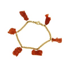 Jona 18 Karat Yellow Gold Coral Charm Bracelet