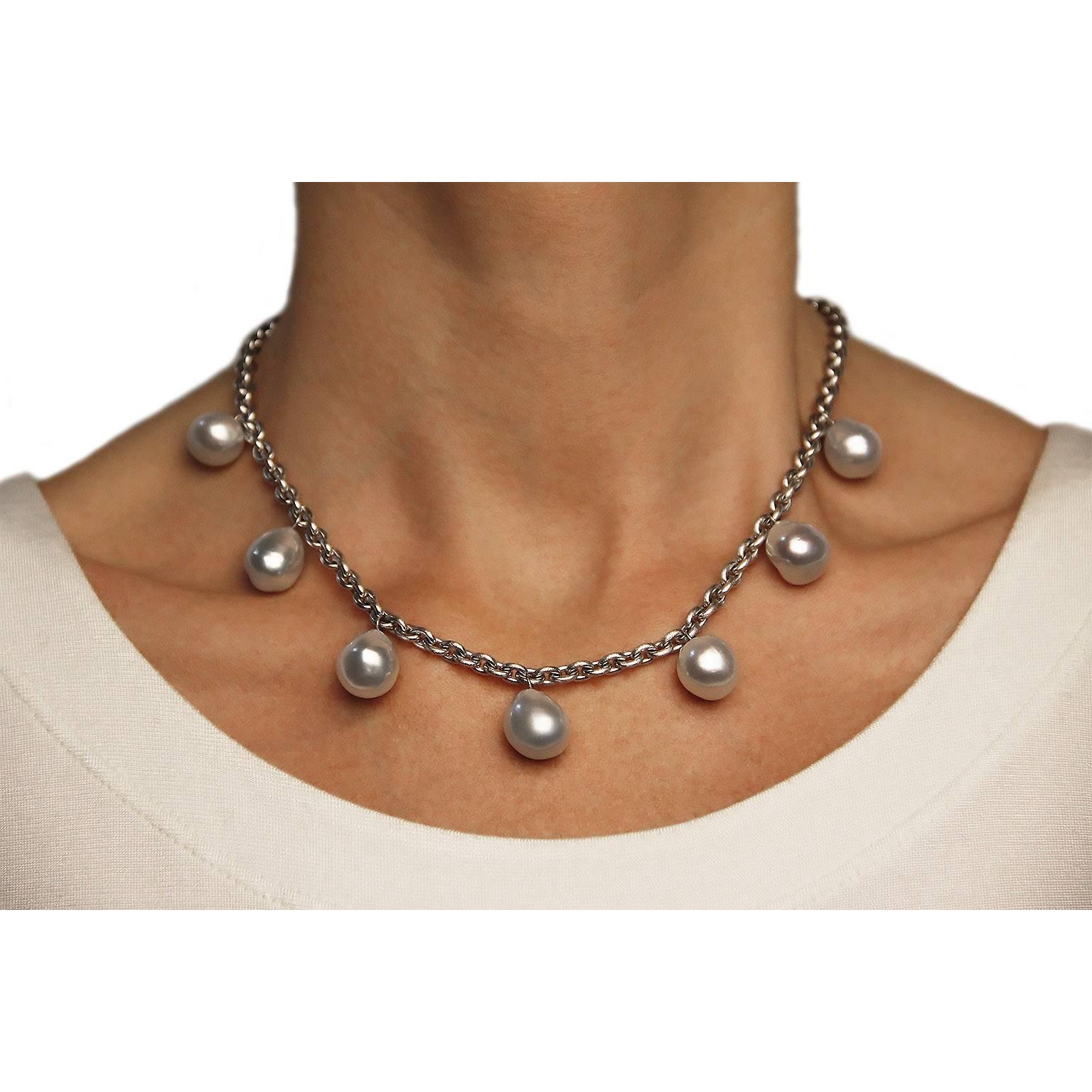 Jona design collection, hand crafted in Italy, 18 karat satin white gold chain necklace suspending seven light grey South Sea baroque pearls.
All Jona jewelry is new and has never been previously owned or worn. Each item will arrive at your door