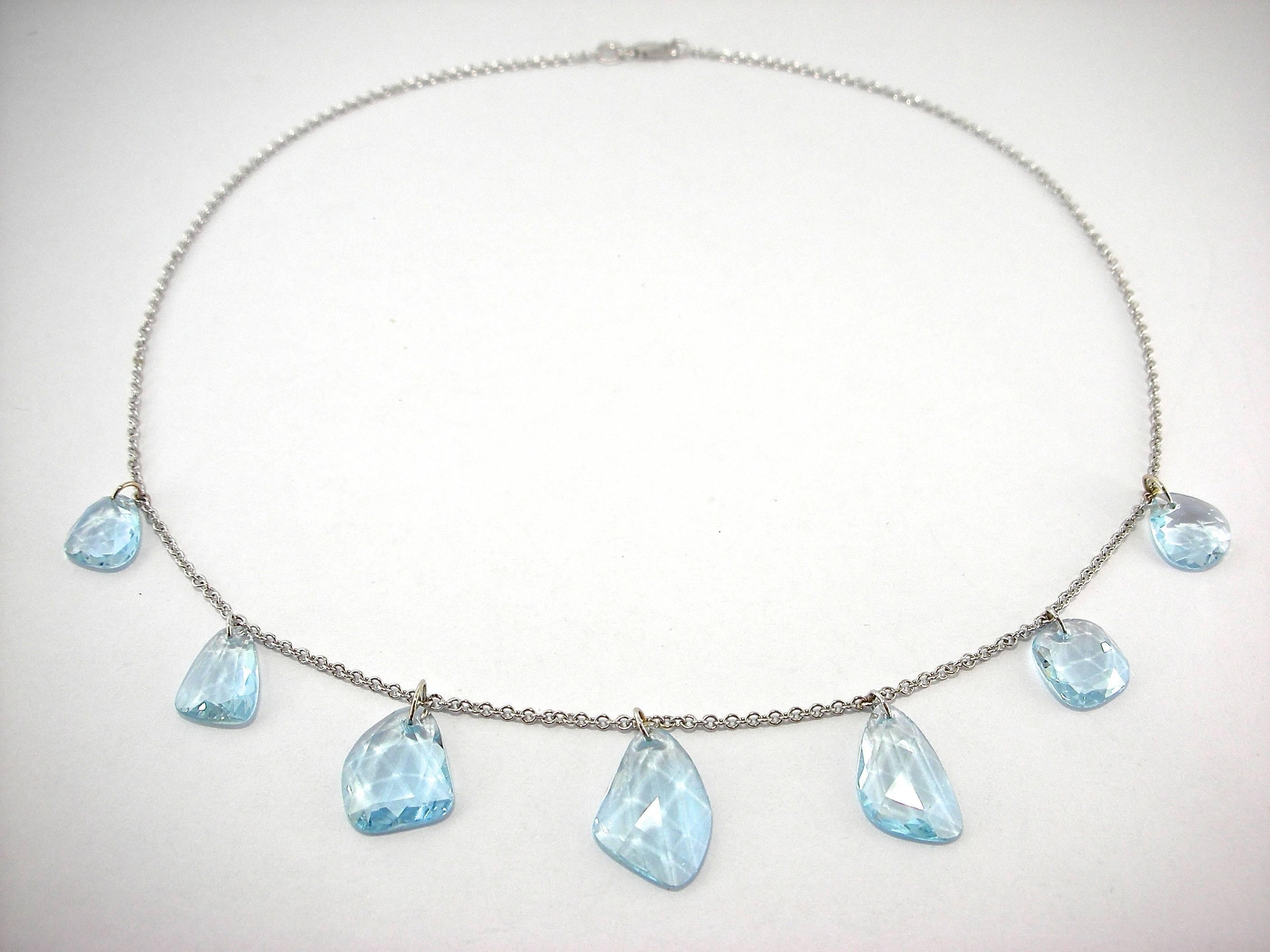 Jona design collection, hand crafted in Italy, 18 karat white gold drop necklace, featuring 26.20 carats of aquamarine flat cut pebbles.
All Jona jewelry is new and has never been previously owned or worn. Each item will arrive at your door