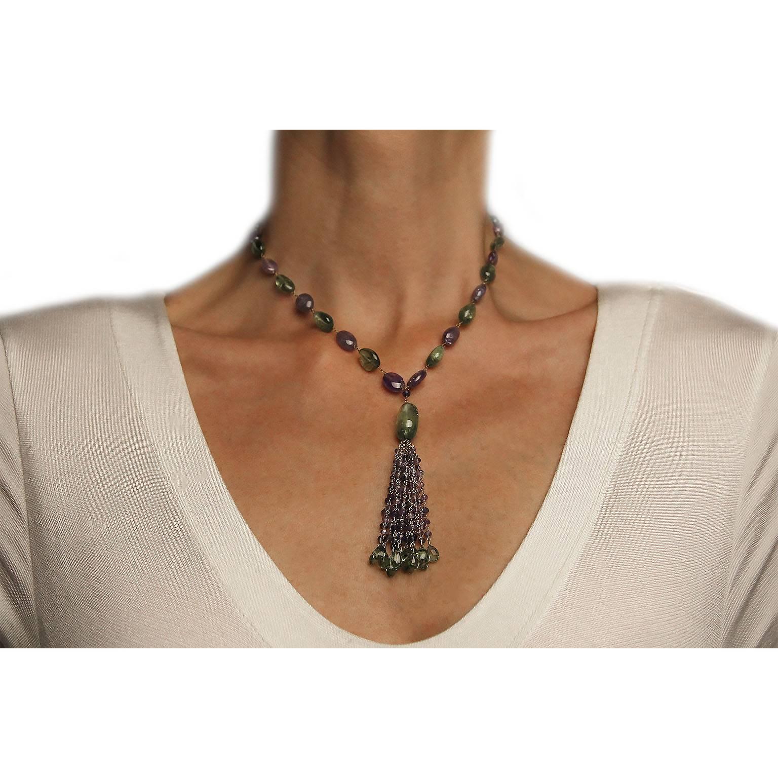 Jona design collection, hand crafted in Italy, 18 karat yellow gold tassel necklace, featuring 203.75 carats of Iolite and Peridot beads.
All Jona jewelry is new and has never been previously owned or worn. Each item will arrive at your door
