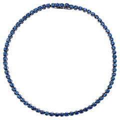 Alex Jona: 18 Karat Weißgold-Tennisarmband mit blauem Saphir