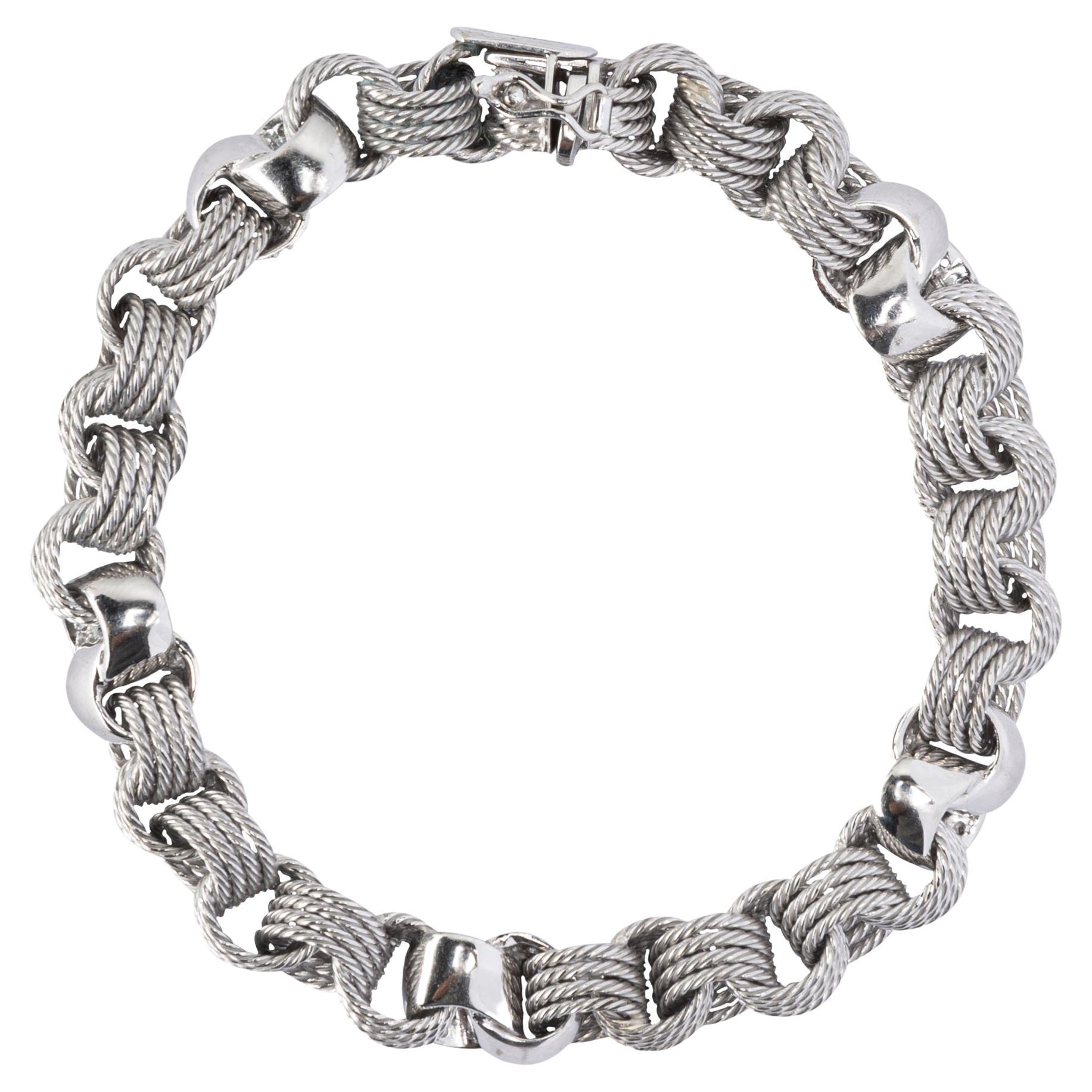 Alex Jona design collection, hand crafted in Italy, 18 karat white gold bracelet with 5 links set with 0.90 carats of white diamonds, G color, VS clarity.

Alex Jona jewels stand out, not only for their special design and for the excellent quality