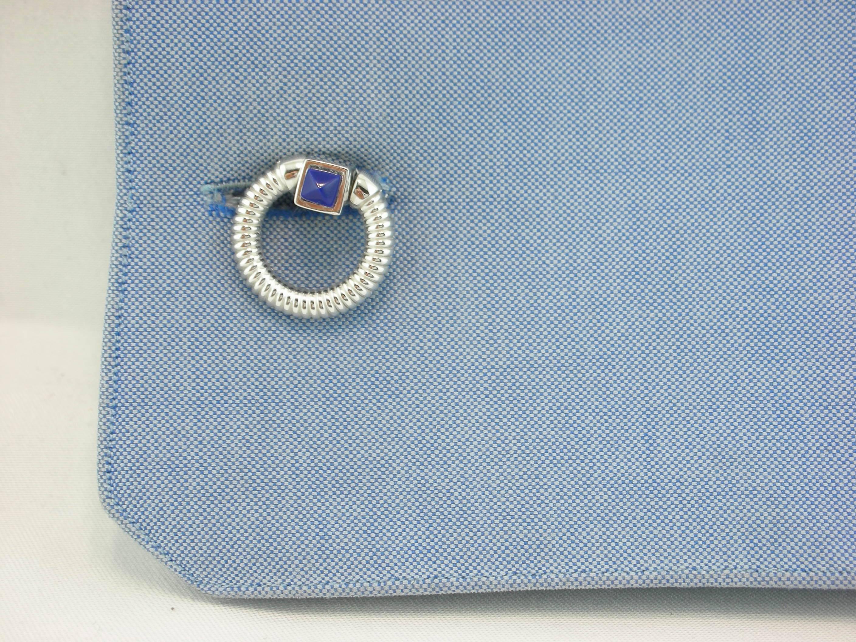 Jona design collection, hand crafted in Italy, rhodium plated sterling silver double ring folding cufflinks with lapis. Marked 