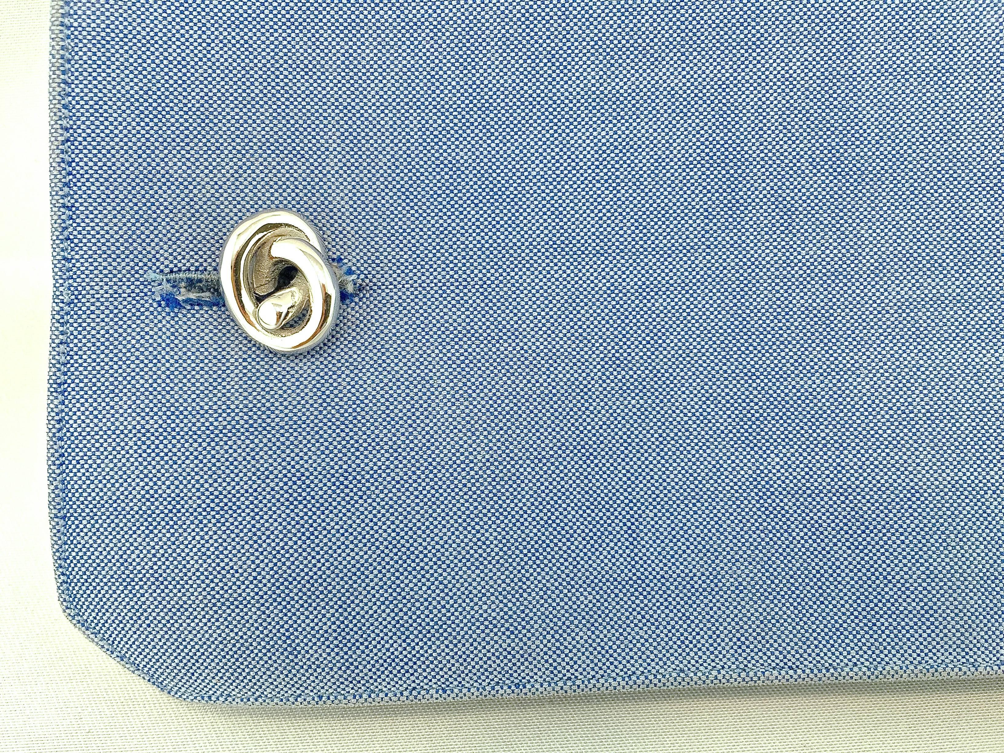 Alex Jona design collection, rhodium plated sterling silver knot cufflinks. Marked 