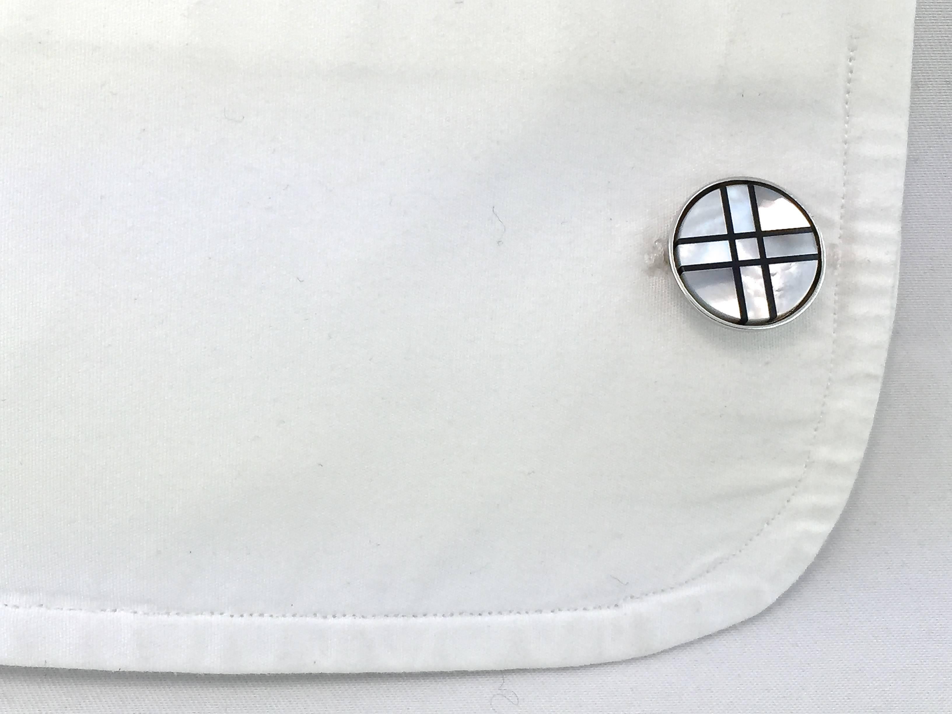 Jona design collection, hand crafted in Italy, sterling silver cufflinks with mother of pearl & onyx inlay.
Buttons diameter: 0.55 inch.
All Jona jewelry is new and has never been previously owned or worn. 