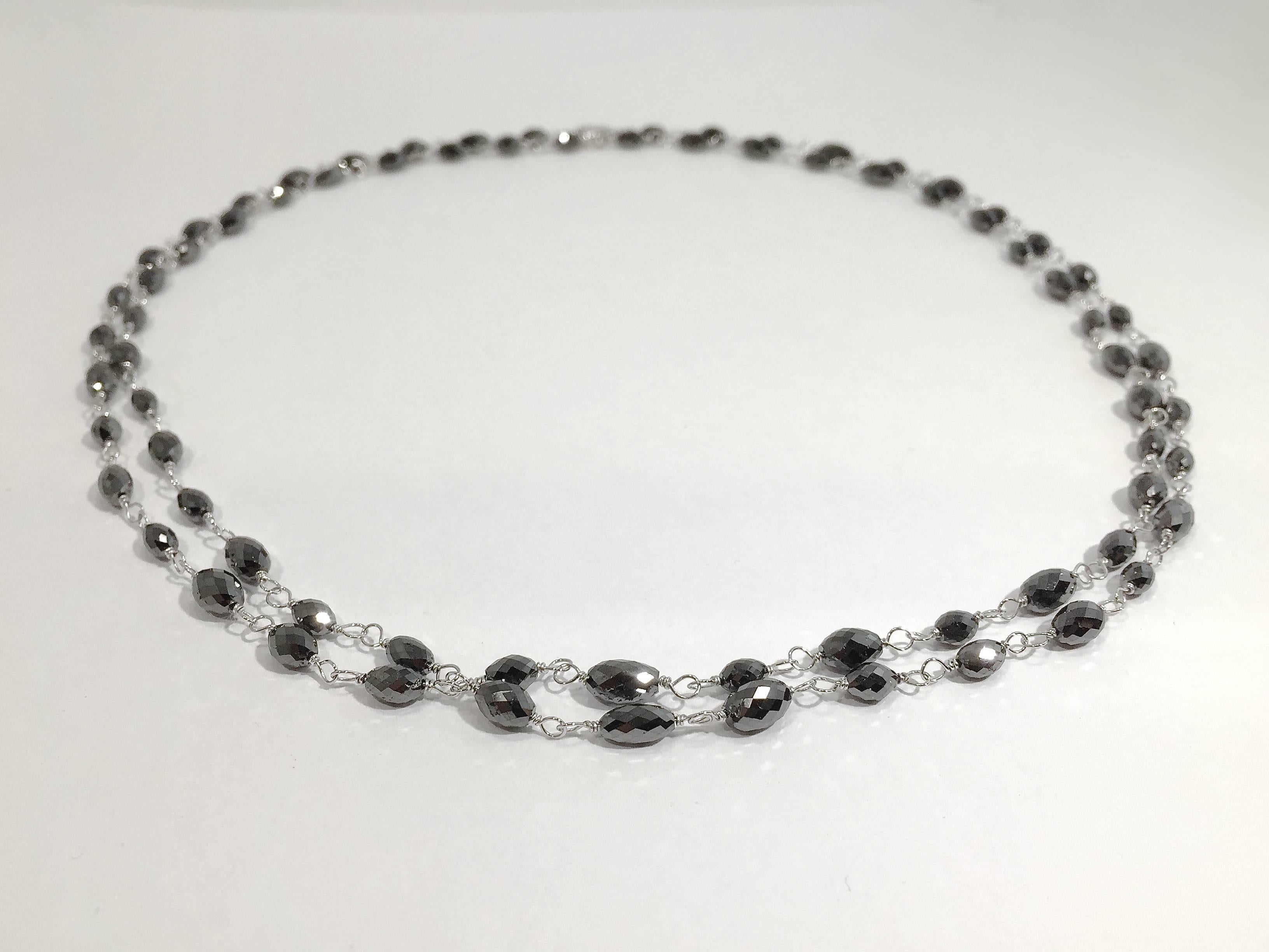 Jona design collection, hand crafted in Italy, 18 Karat white gold oval briolette black diamond 35,43 Inch long necklace. Total diamond weight ct. 49,75.

All Jona jewelry is new and has never been previously owned or worn.. 