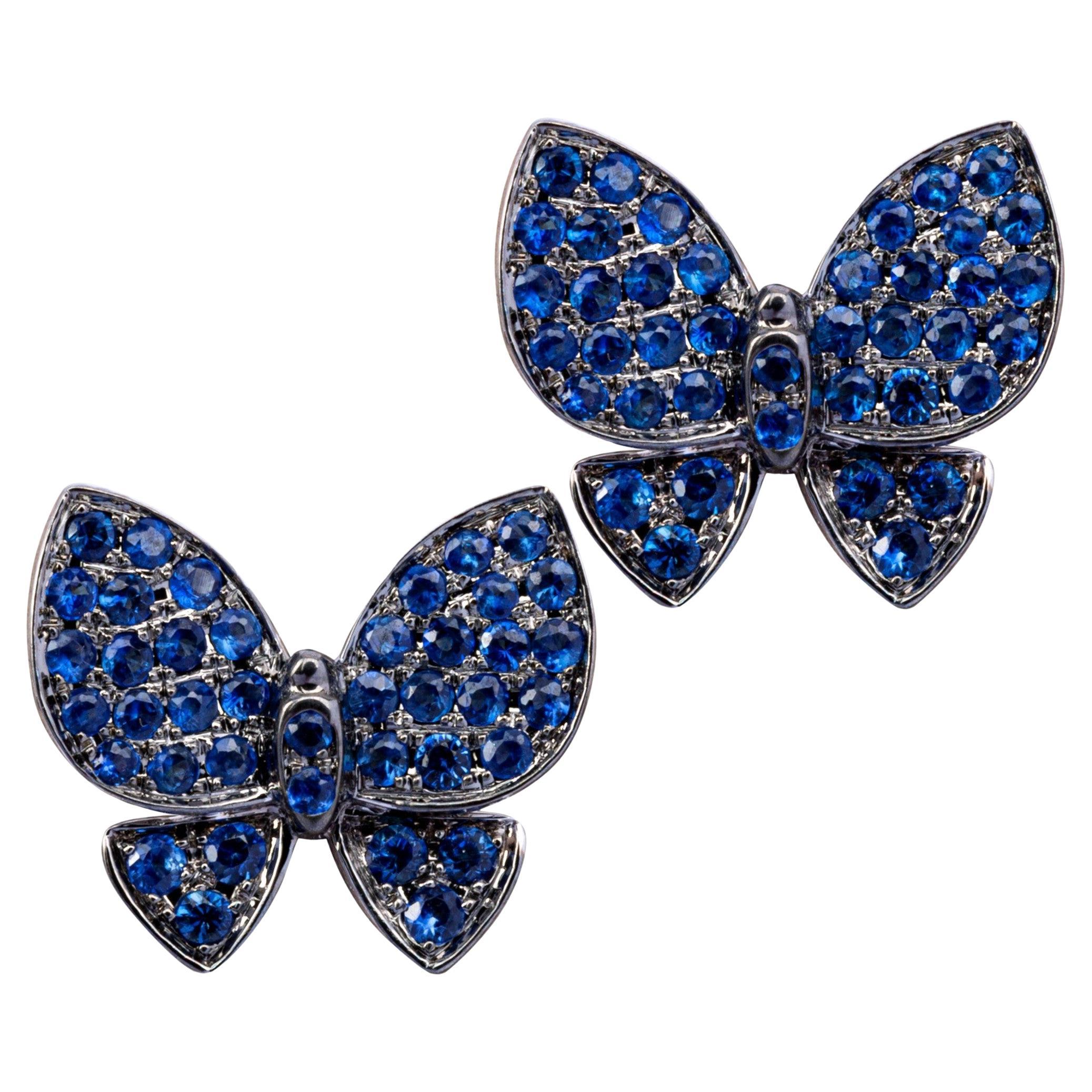 Alex Jona, boucles d'oreilles papillon en or blanc 18 carats et saphir bleu
