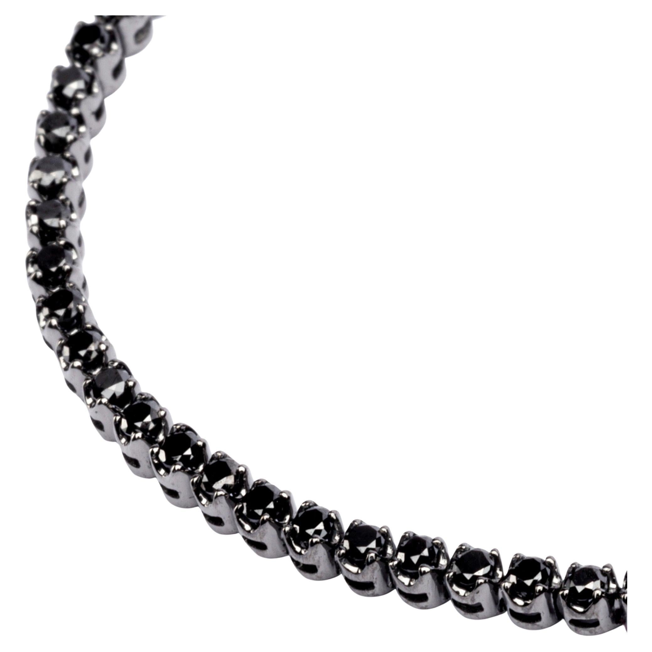 Alex Jona design collection, hand crafted in Italy, 18 karat black rhodium white gold tennis bracelet, 7.48 in/19 cm long, set with black diamonds weighing 1.81 carats in total. 

Alex Jona jewels stand out, not only for their special design and for