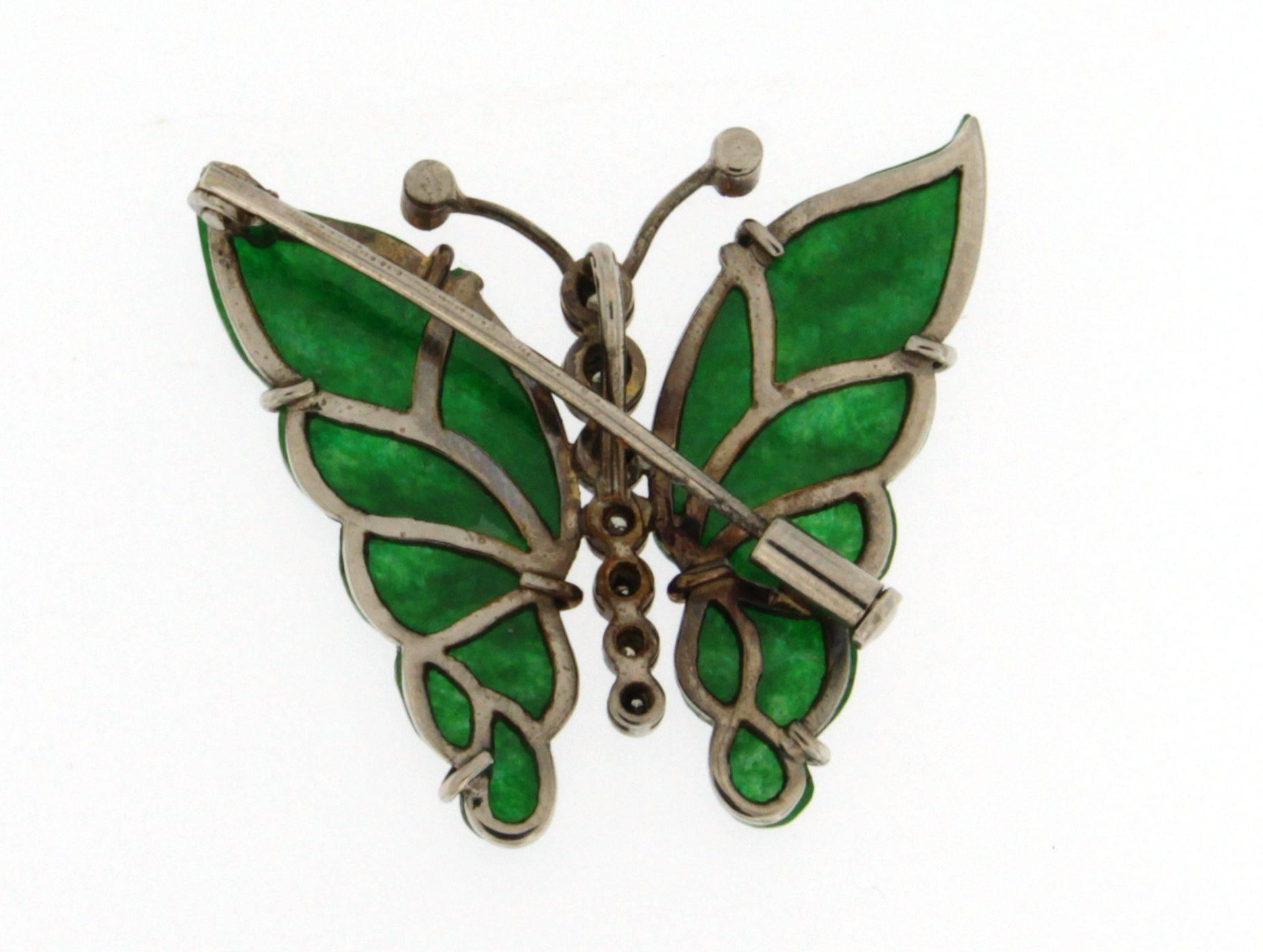 Jona design collection, 18 karat white gold butterfly brooch, consisting of a body set with white diamonds and burmese jadeite wings. 
All Jona jewelry is new and has never been previously owned or worn. Each item will arrive at your door